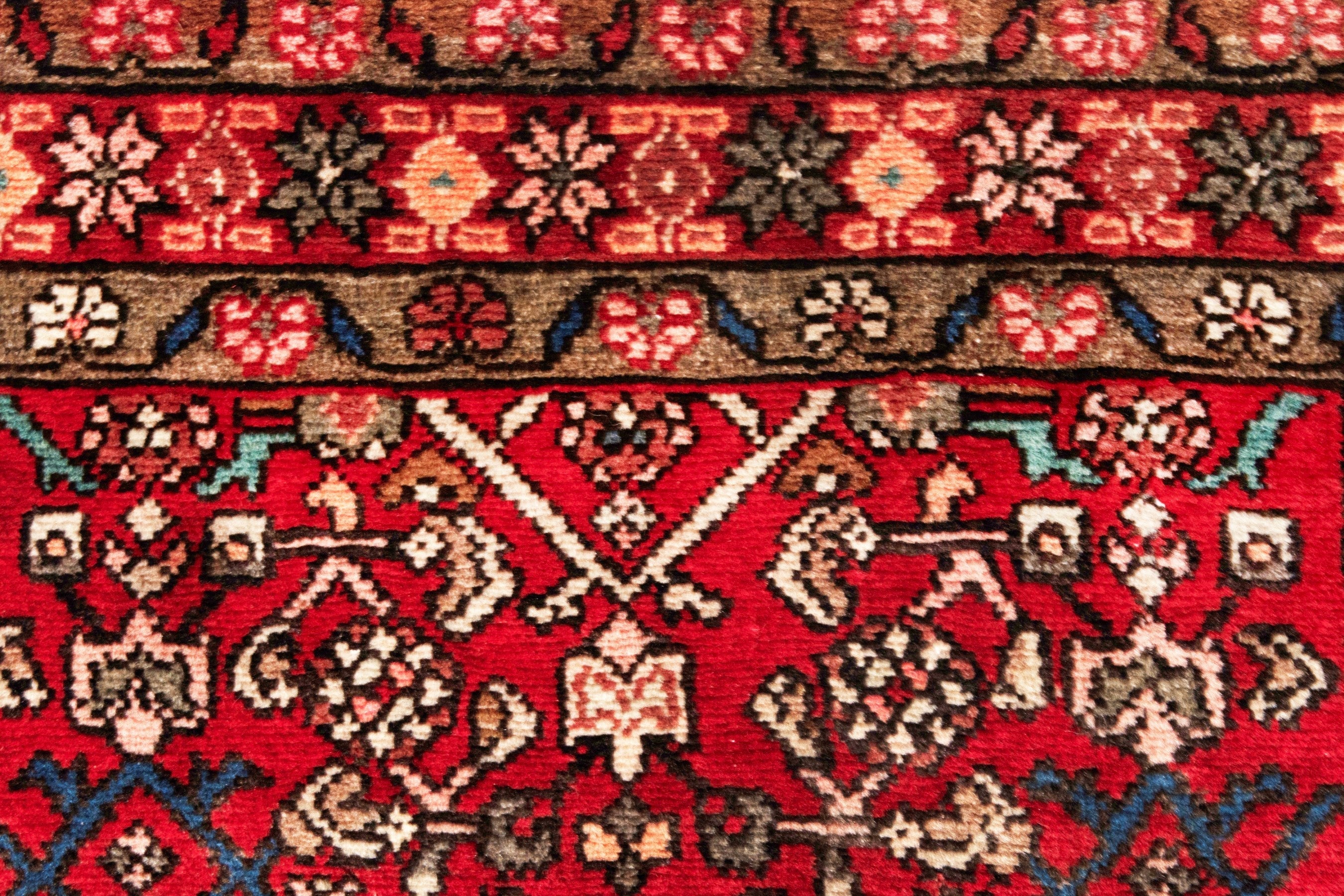 Persian Hosseinabad runner rug in deep red and tan, view 14 of 20