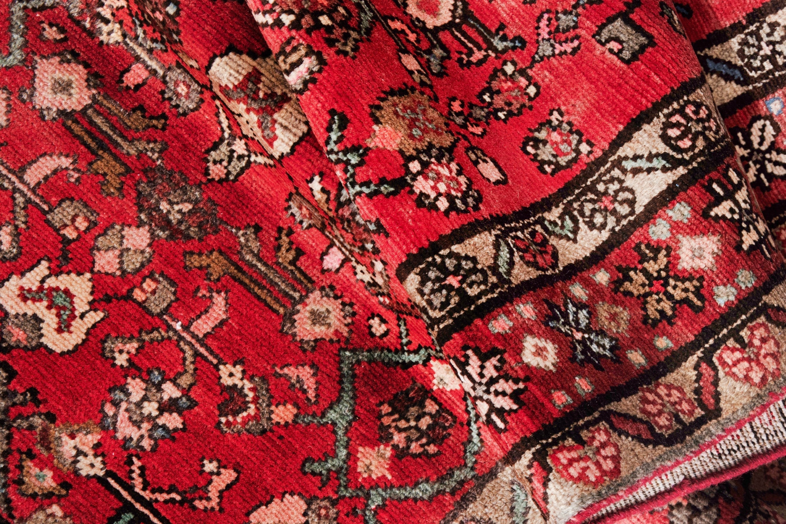 Persian Hosseinabad runner rug in deep red and tan, view 19 of 20