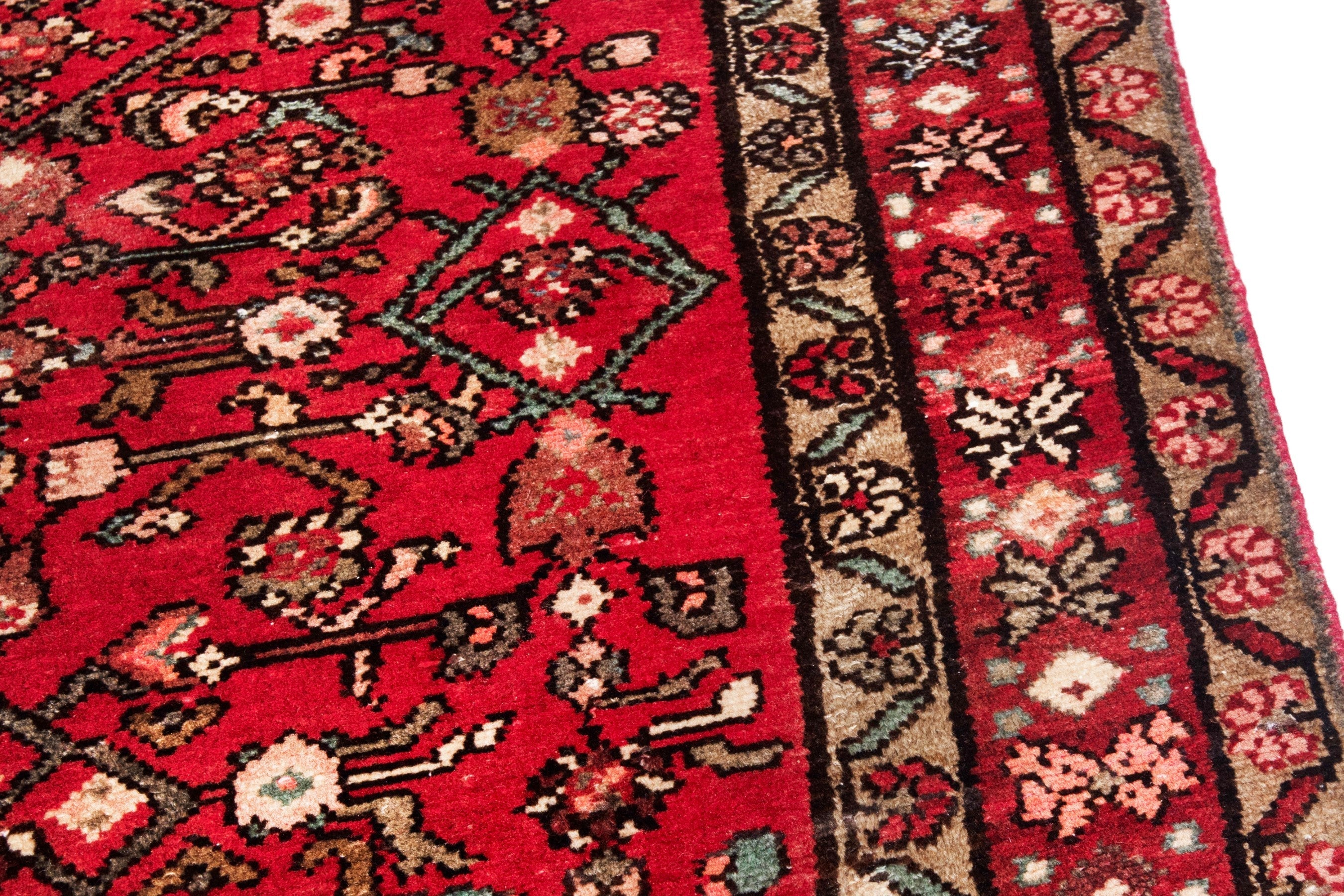 Persian Hosseinabad runner rug in deep red and tan, view 9 of 20