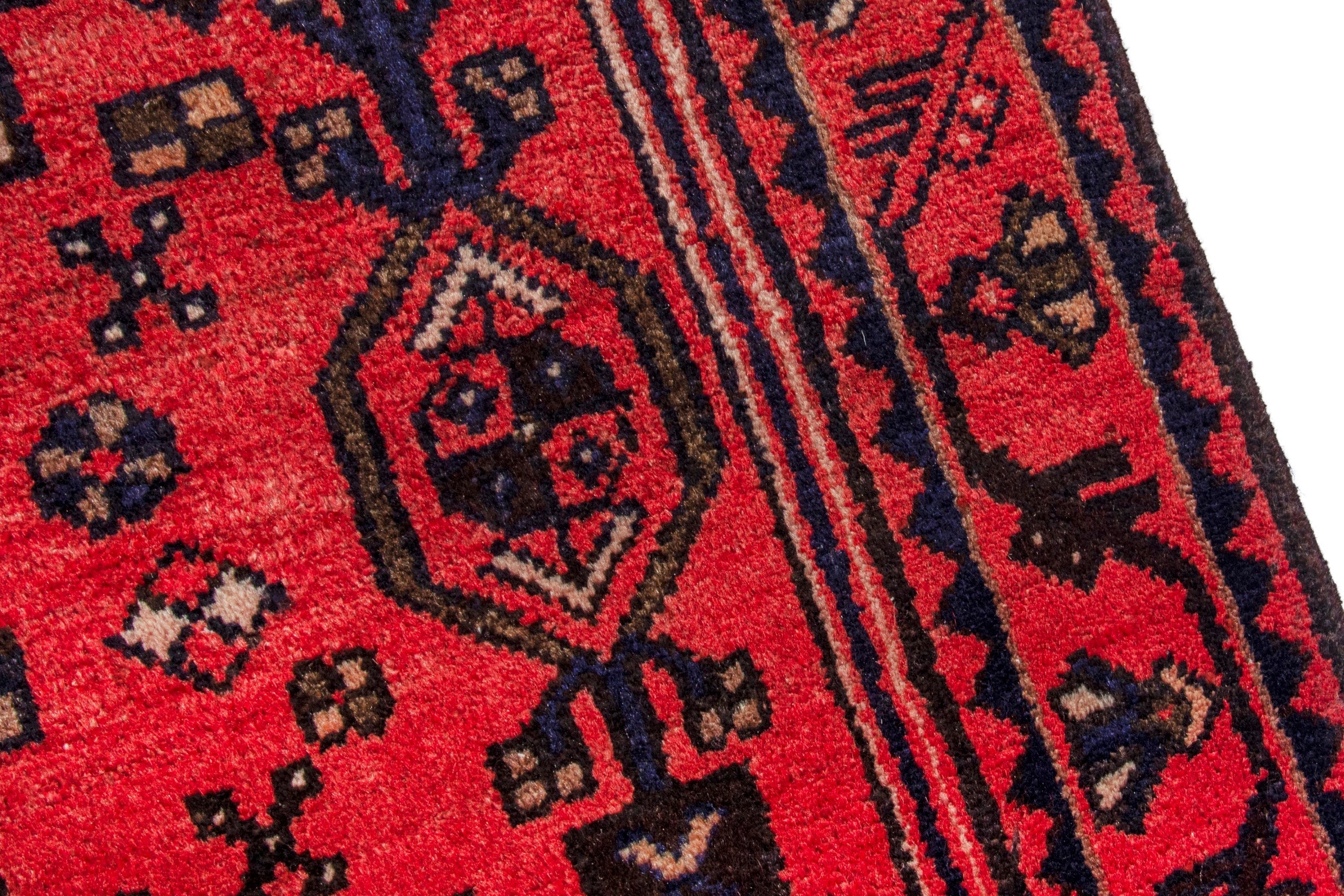 Persian Zanjan runner rug in deep red and burgundy, view 8 of 20