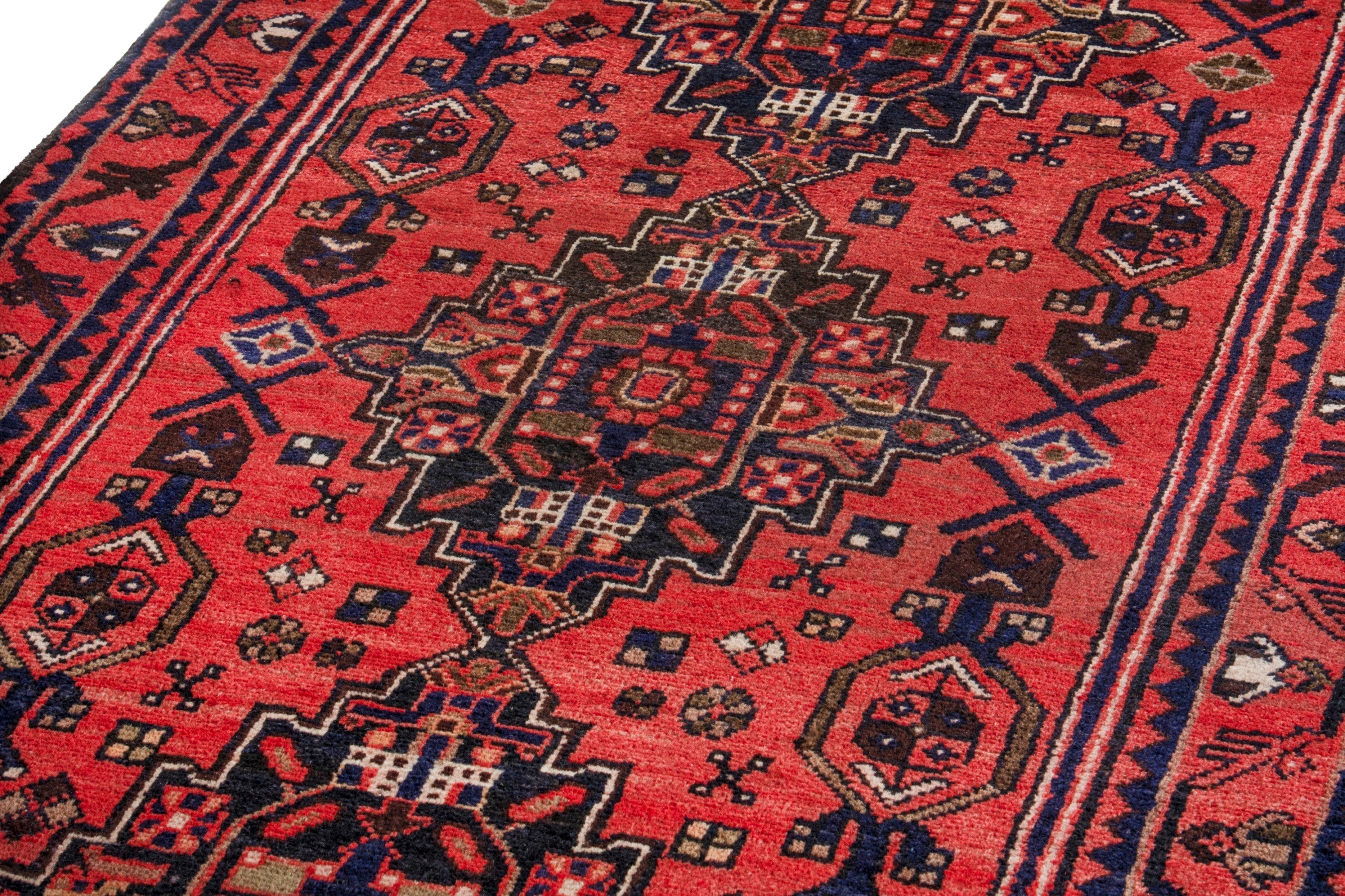 Persian Zanjan runner rug in deep red and burgundy, view 9 of 20