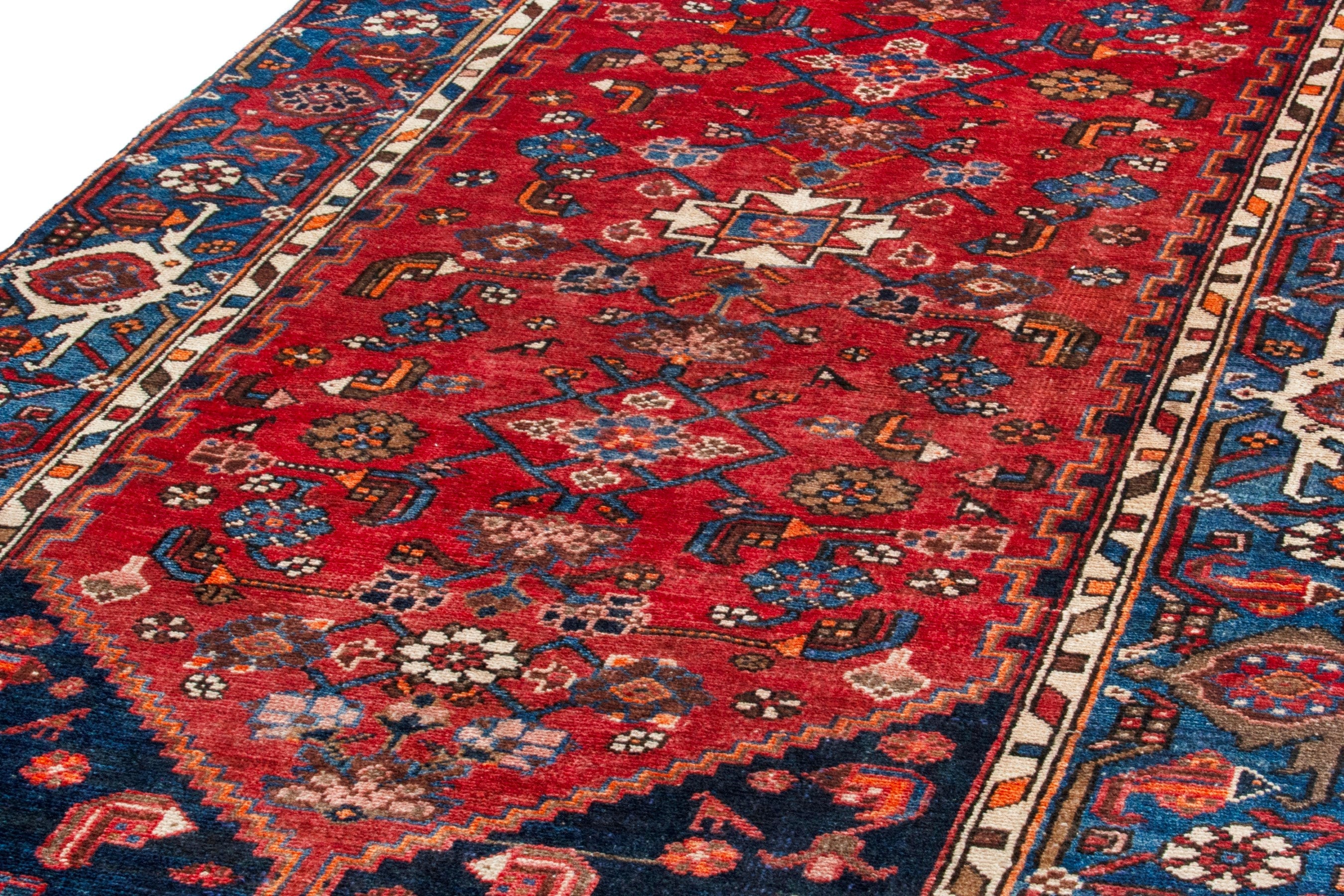Persian Zanjan area rug in navy and rust, view 5 of 19
