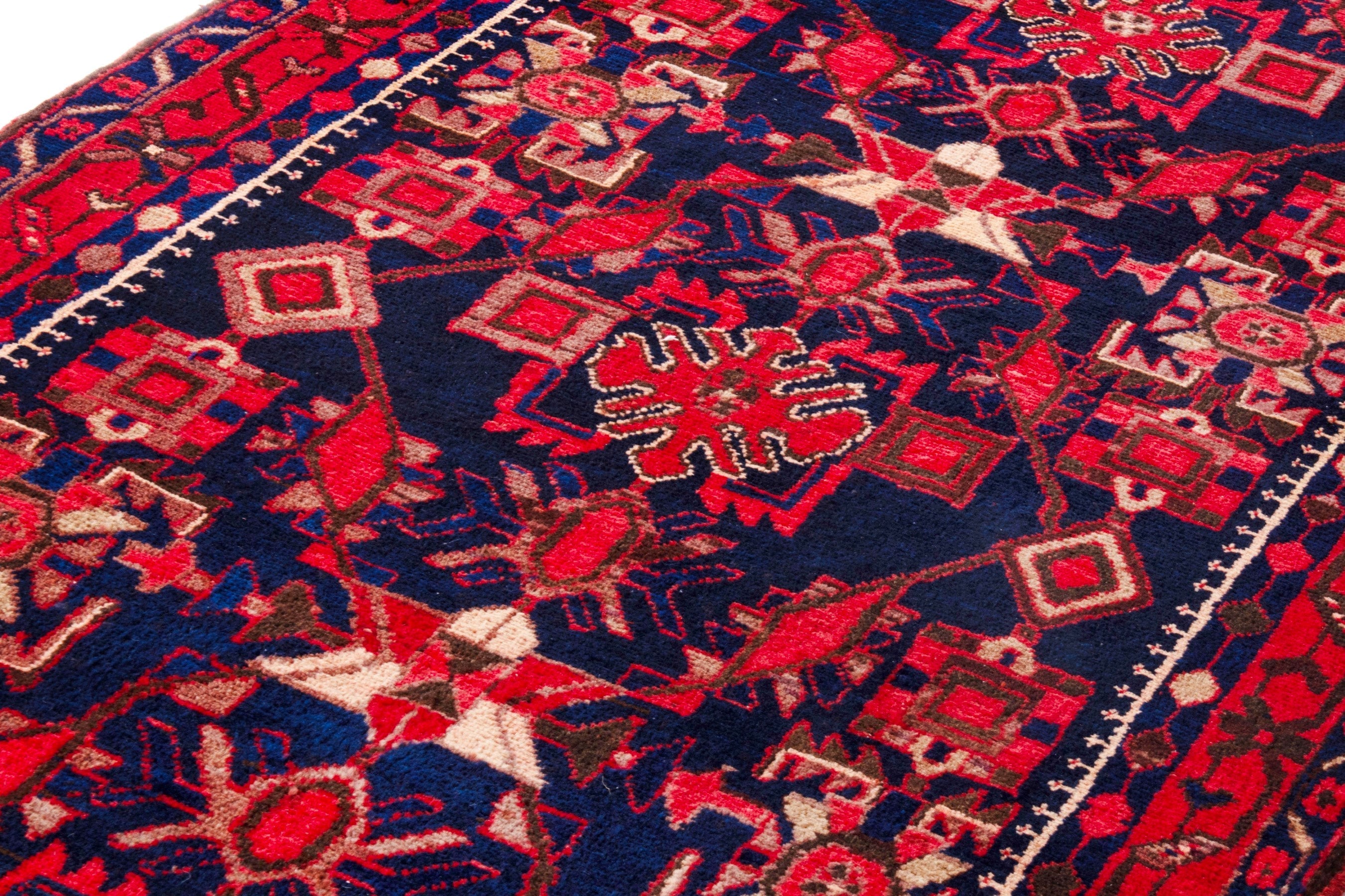 Persian Borujerd runner rug in deep red and navy, view 8 of 25