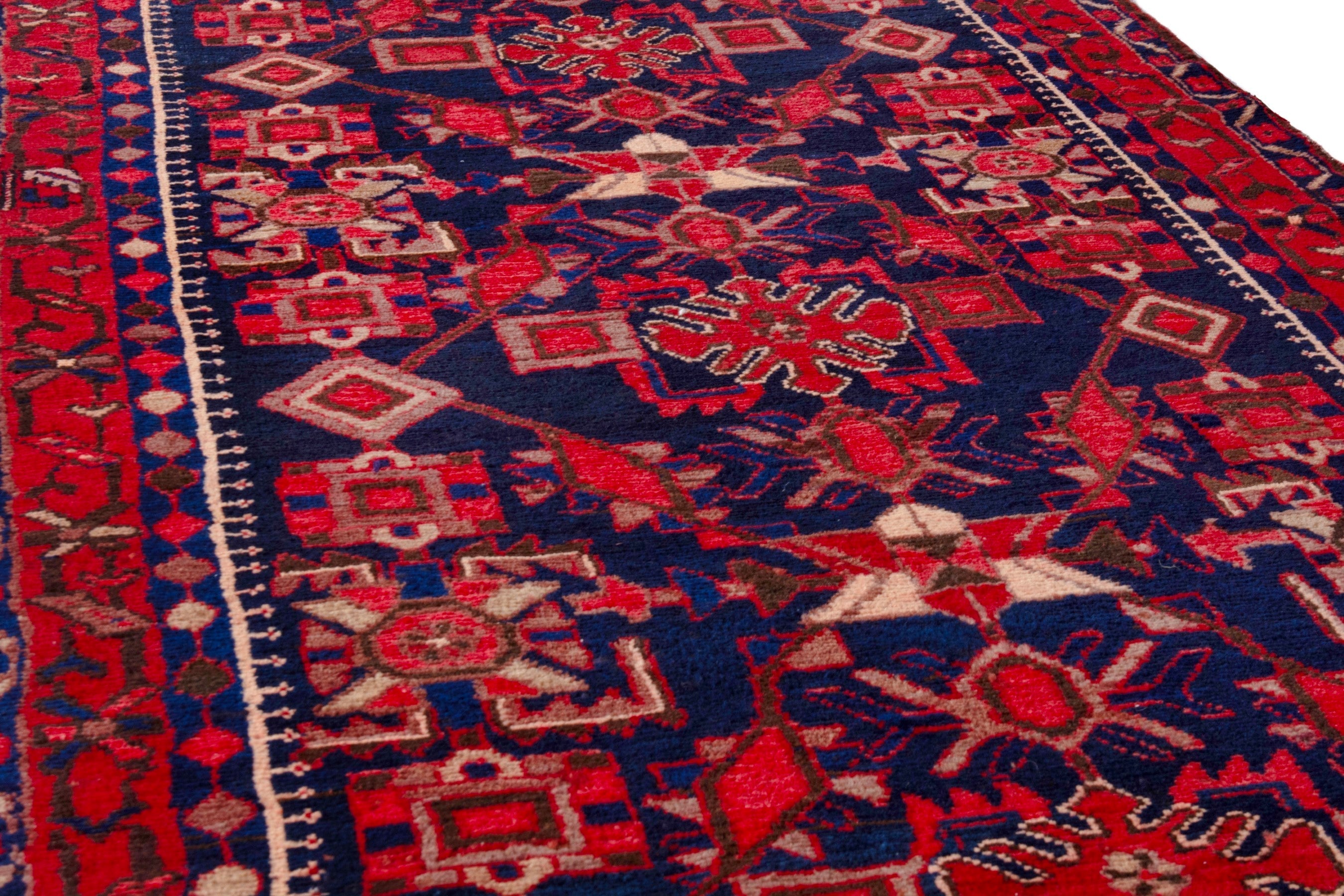 Persian Borujerd runner rug in deep red and navy, view 9 of 25