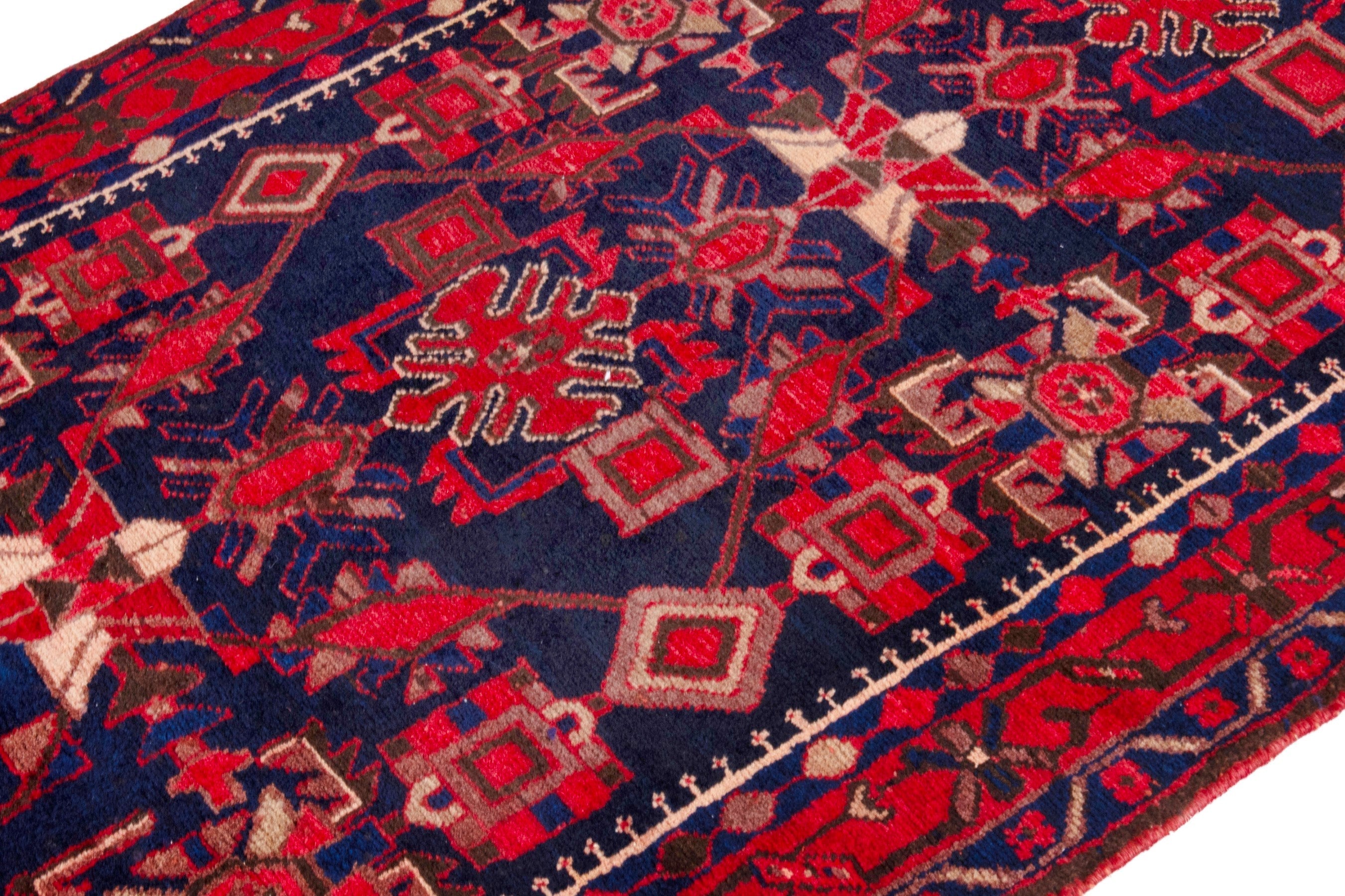 Persian Borujerd runner rug in deep red and navy, view 6 of 25