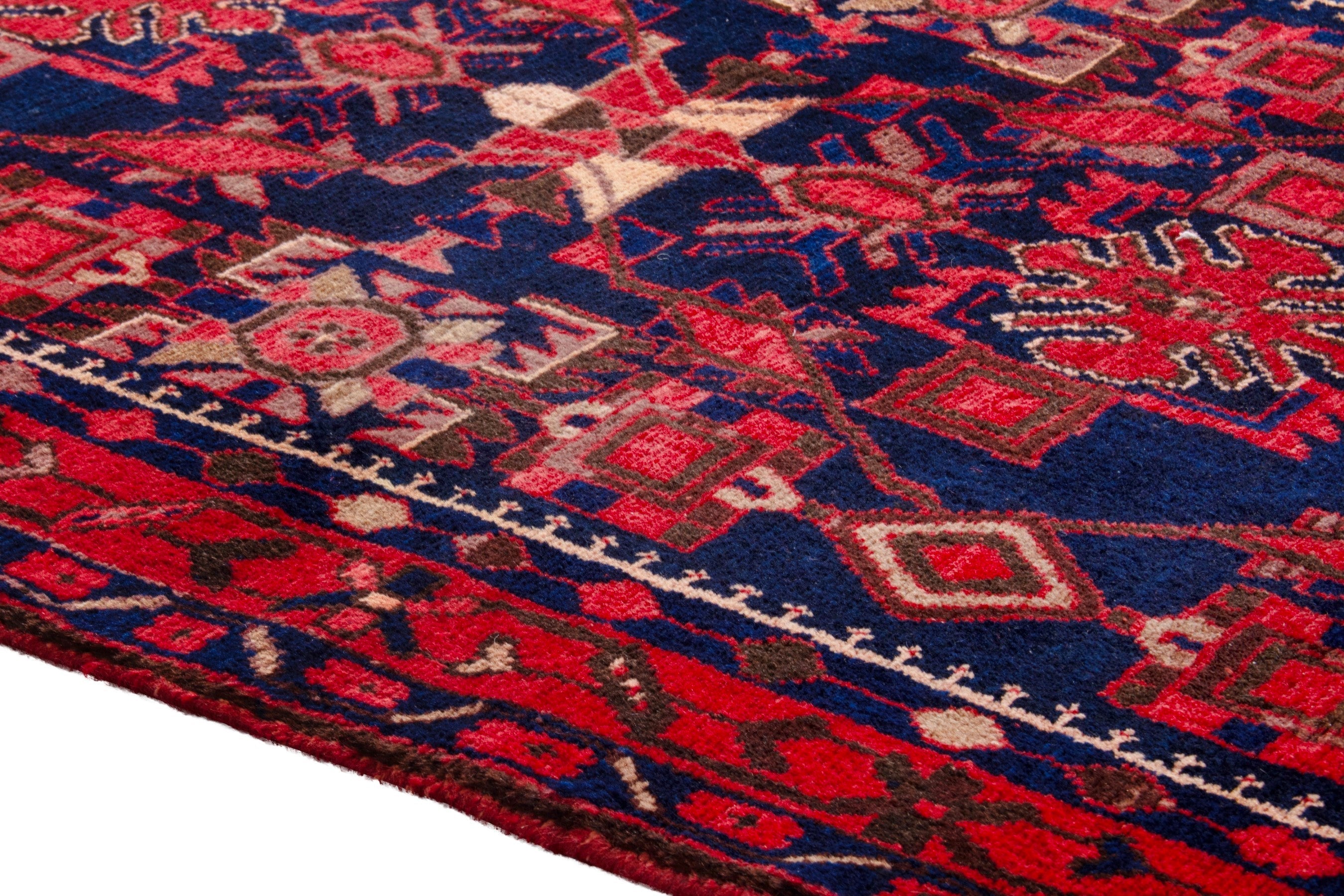 Persian Borujerd runner rug in deep red and navy, view 5 of 25