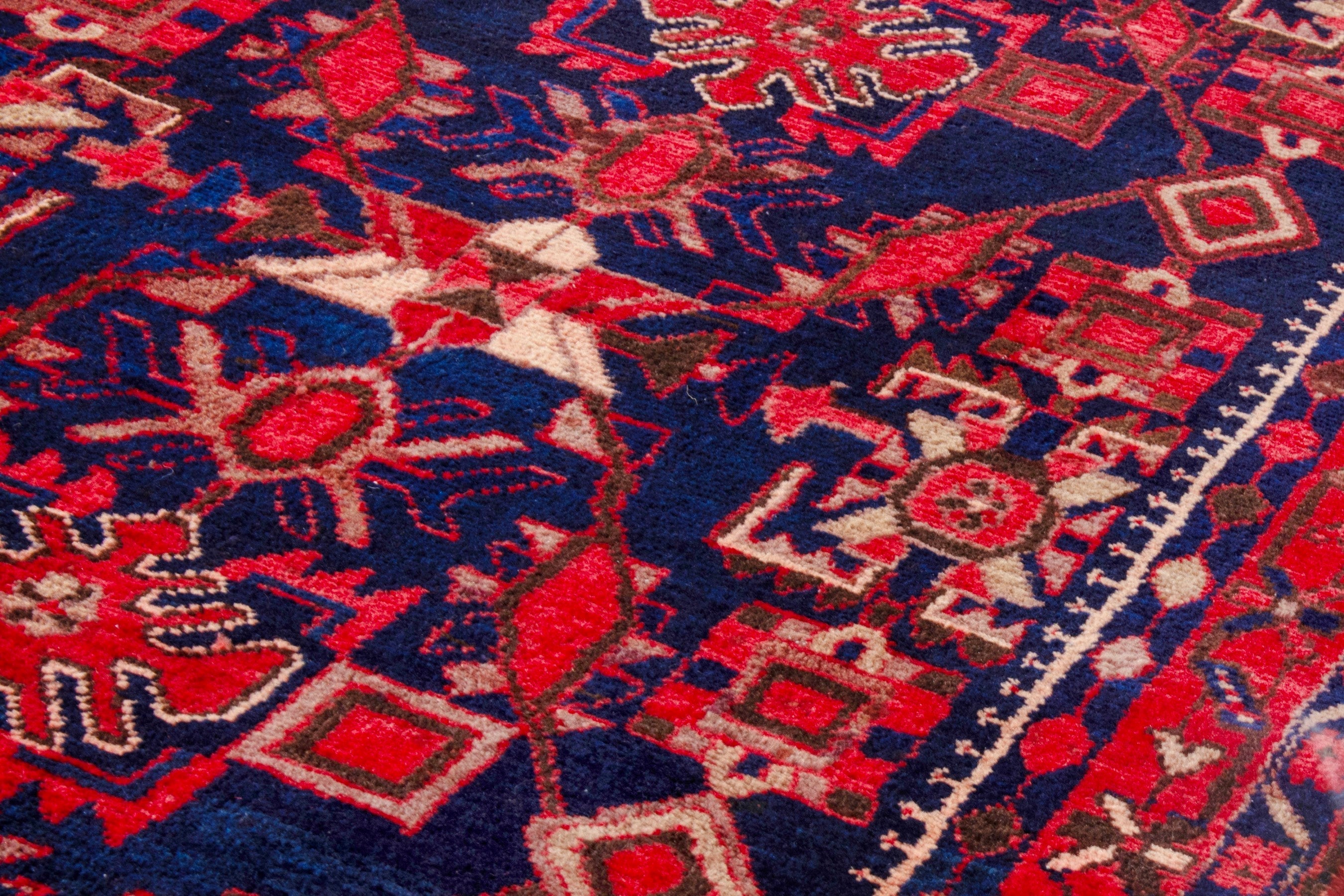 Persian Borujerd runner rug in deep red and navy, view 7 of 25