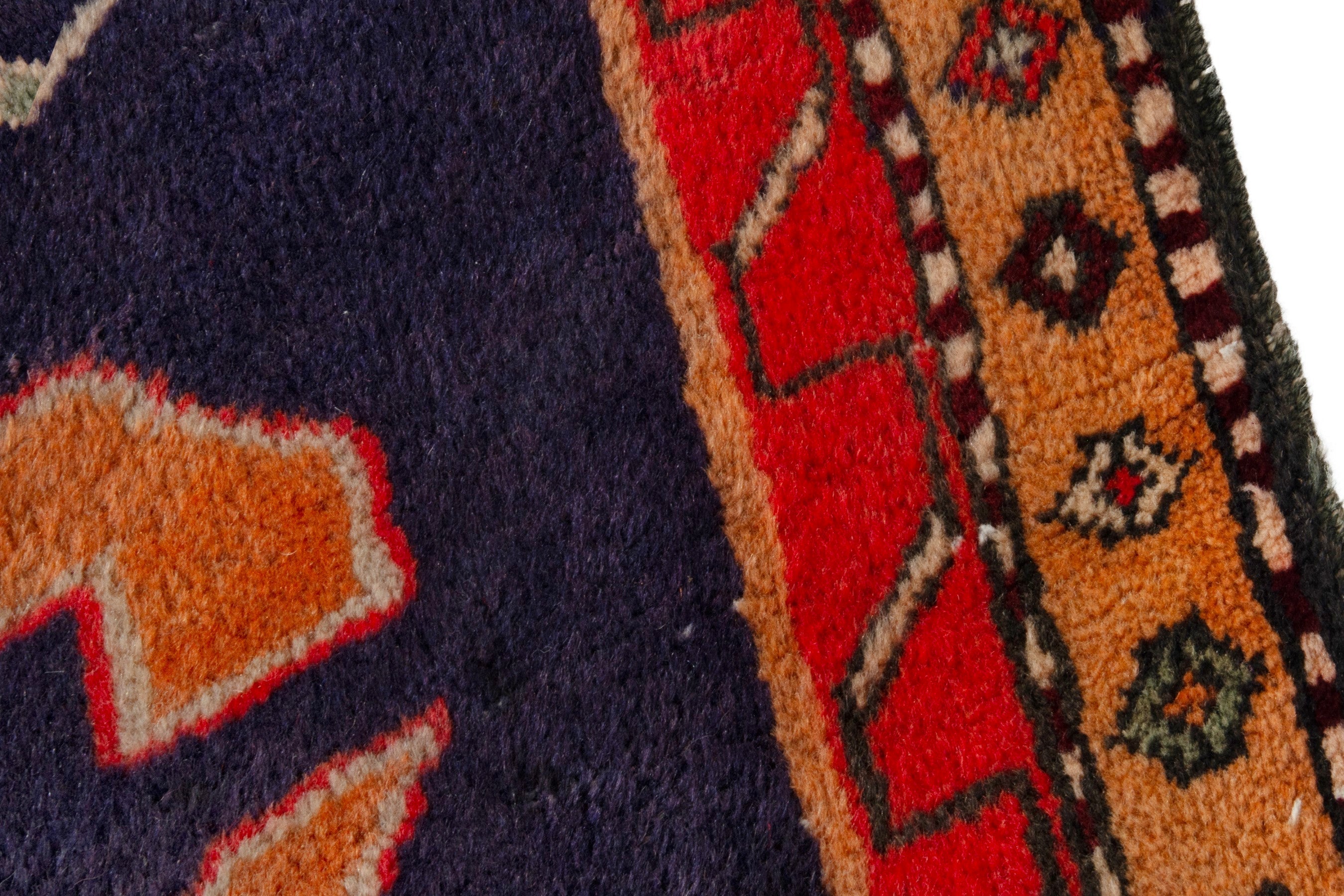 Persian Ardabil runner rug in navy and burnt orange, view 9 of 18
