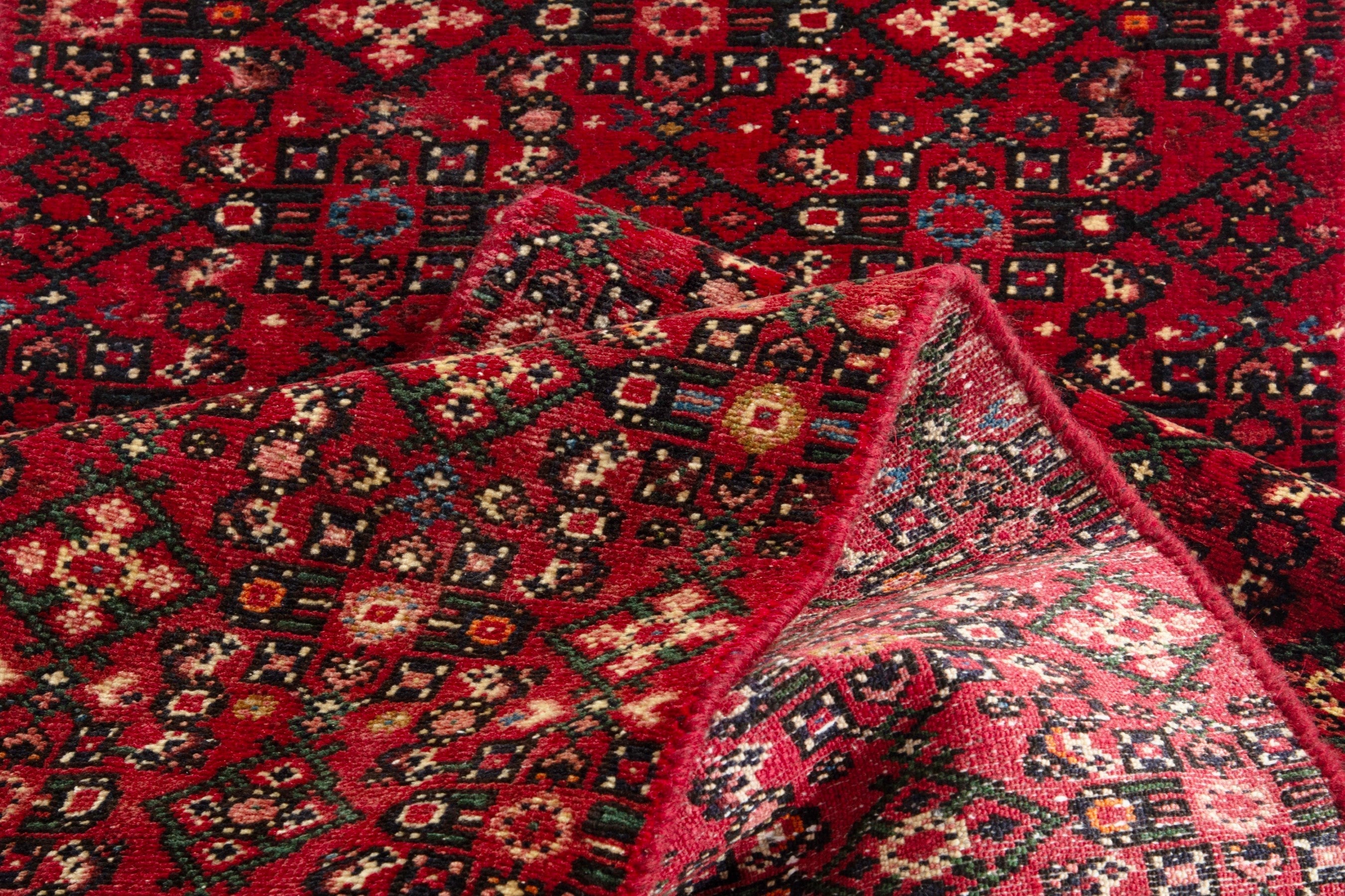 Persian Hosseinabad runner rug in deep red and cream, view 15 of 17