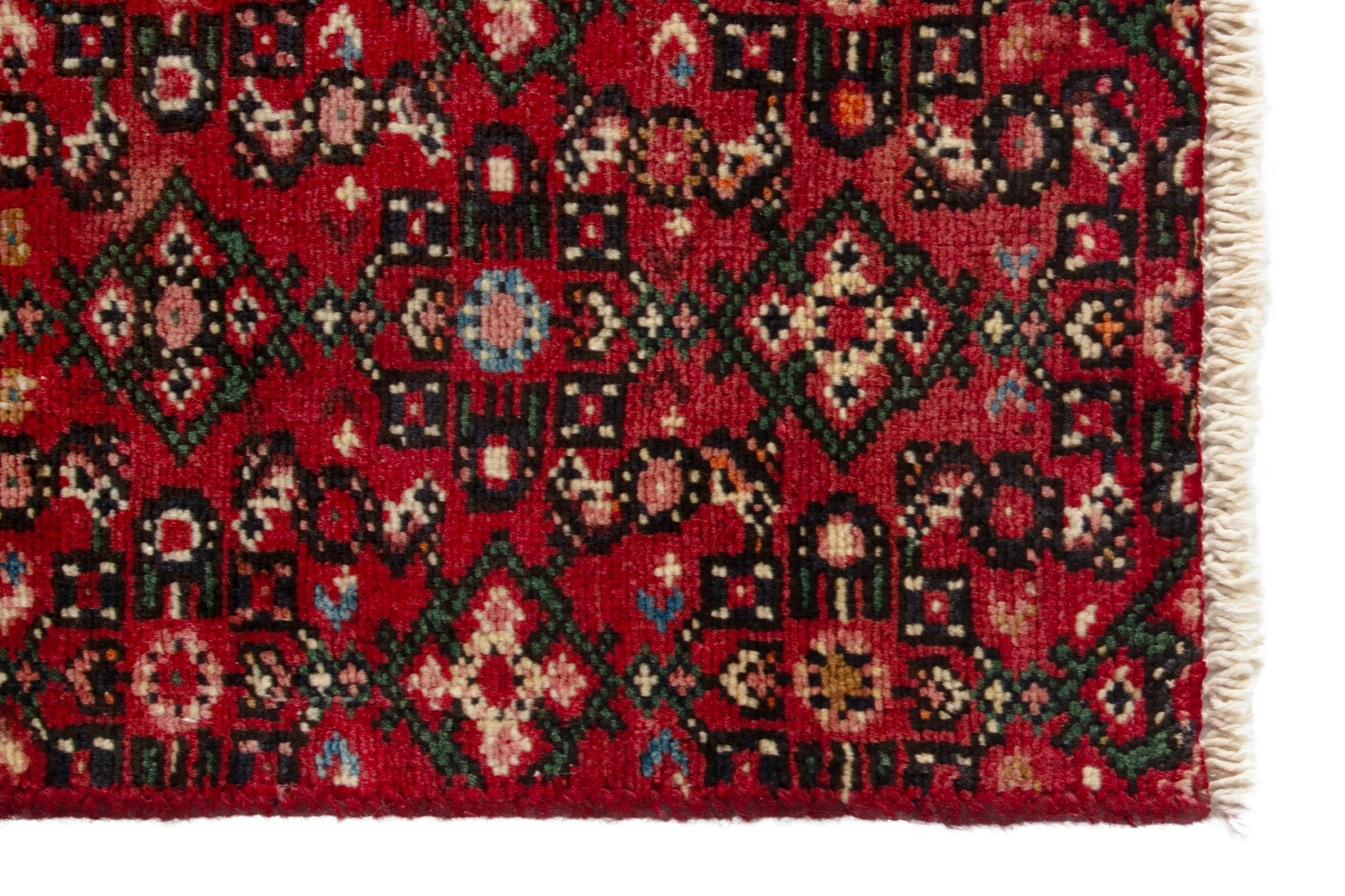 Persian Hosseinabad runner rug in deep red and cream, view 10 of 17