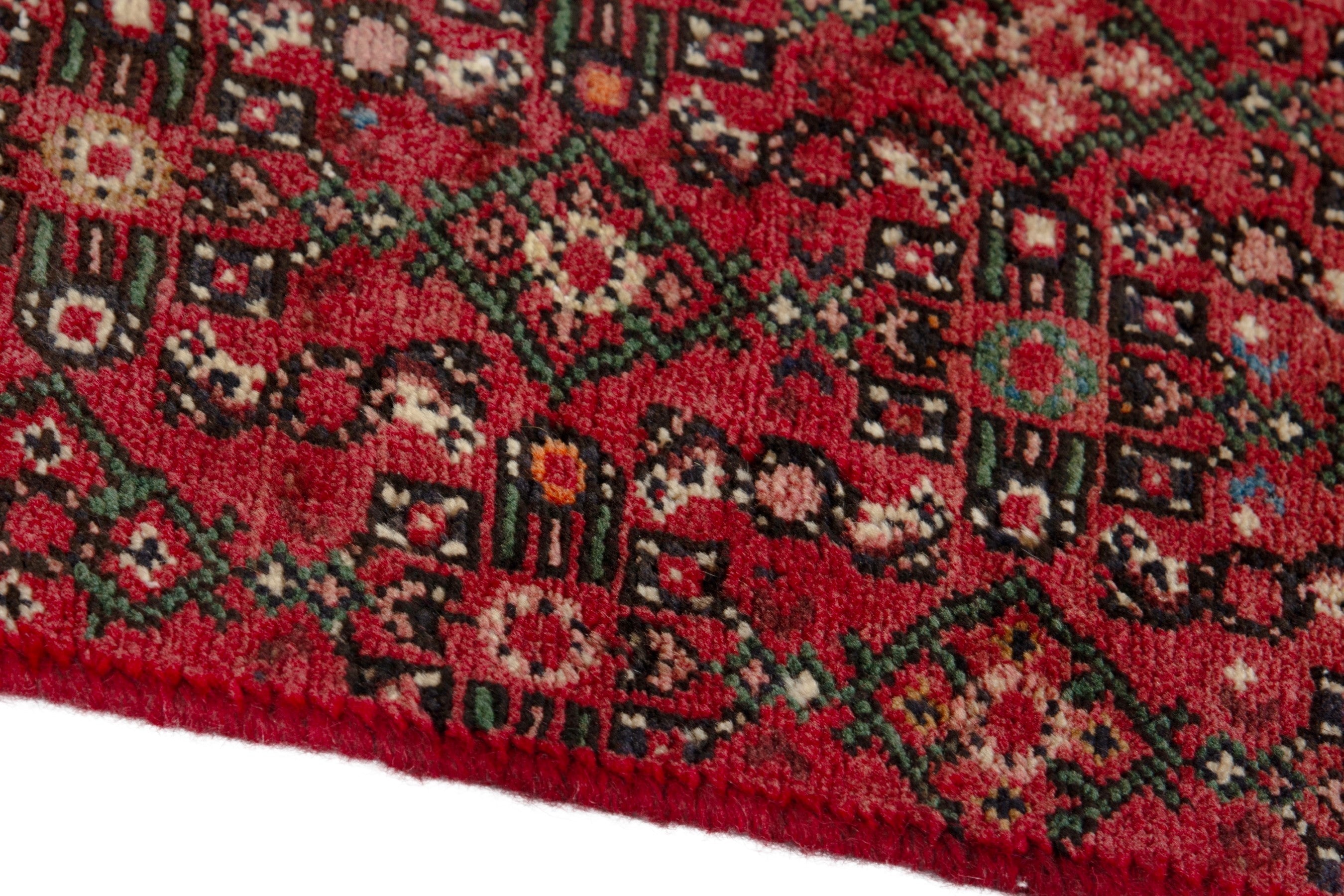 Persian Hosseinabad runner rug in deep red and cream, view 5 of 17