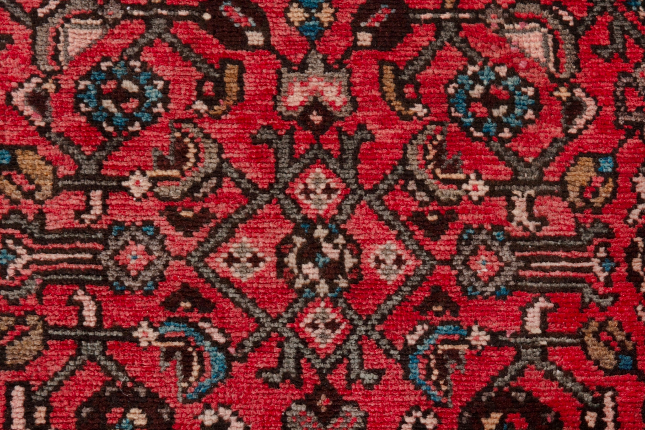 Persian Hosseinabad runner rug in deep red and charcoal, view 16 of 21