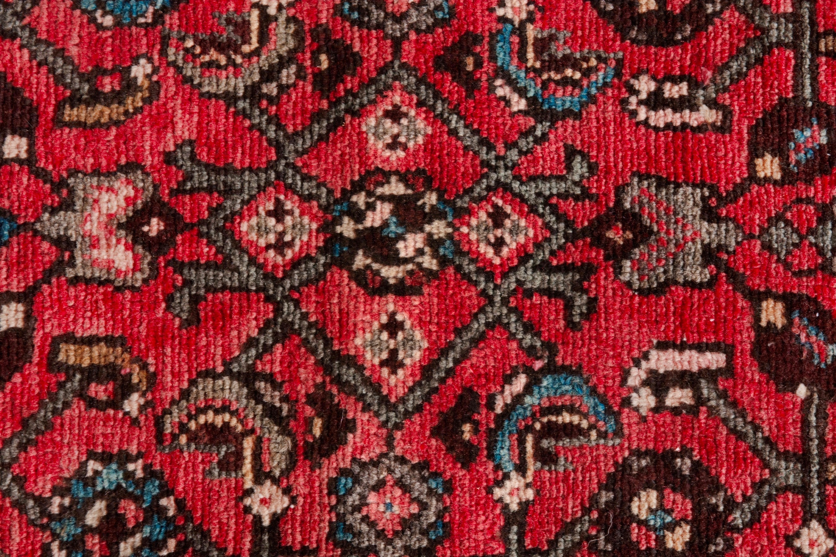 Persian Hosseinabad runner rug in deep red and charcoal, view 17 of 21