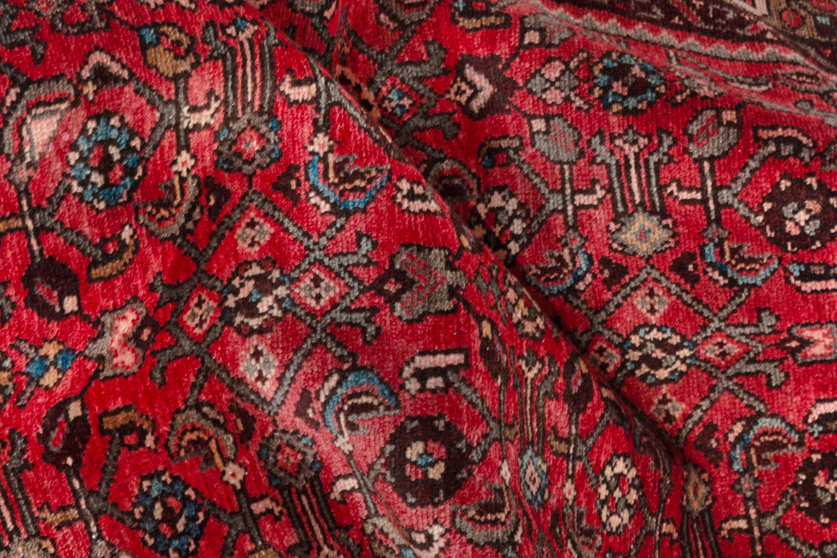 Persian Hosseinabad runner rug in deep red and charcoal, view 18 of 21