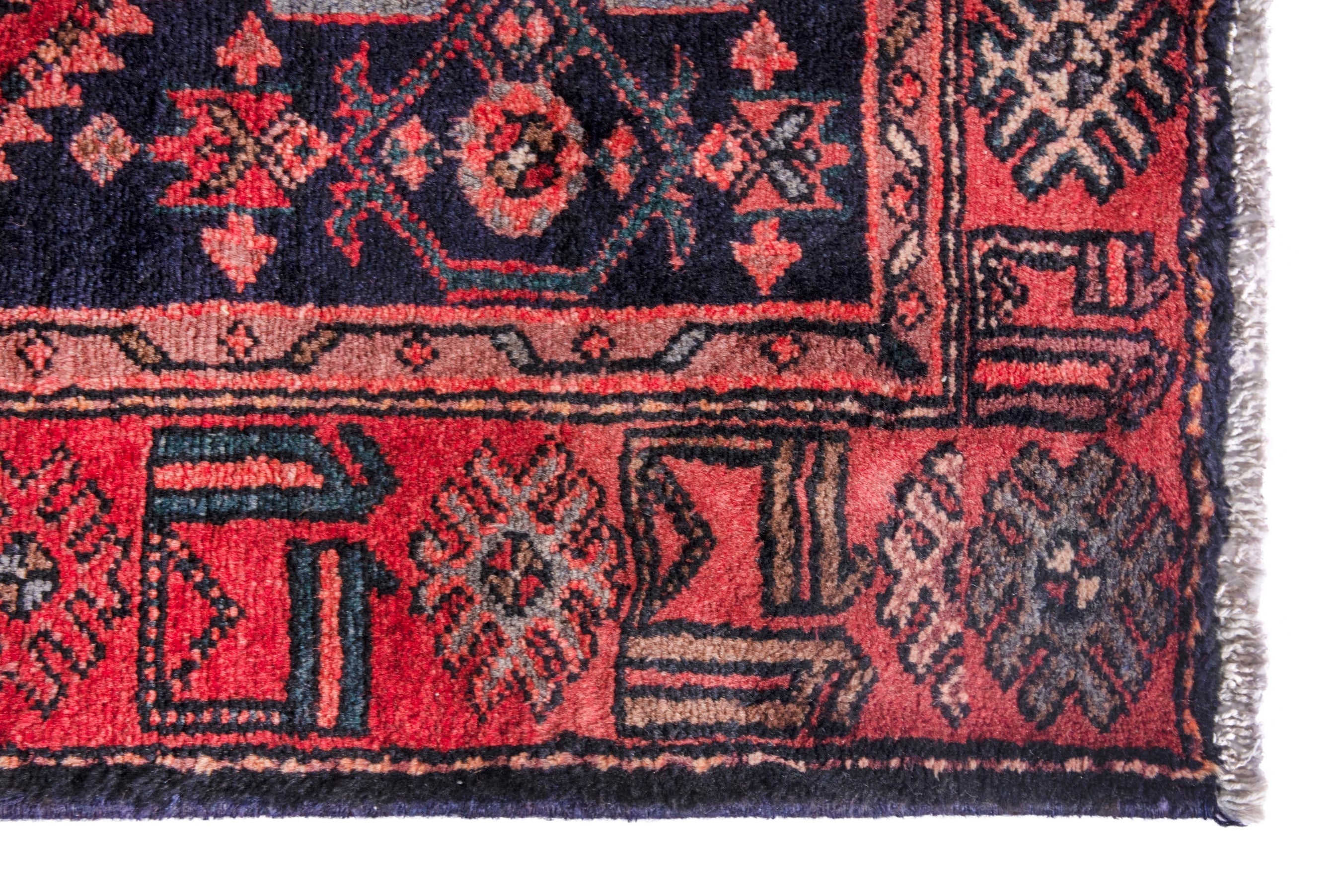 Persian Zanjan runner rug in deep red and burgundy, view 9 of 21