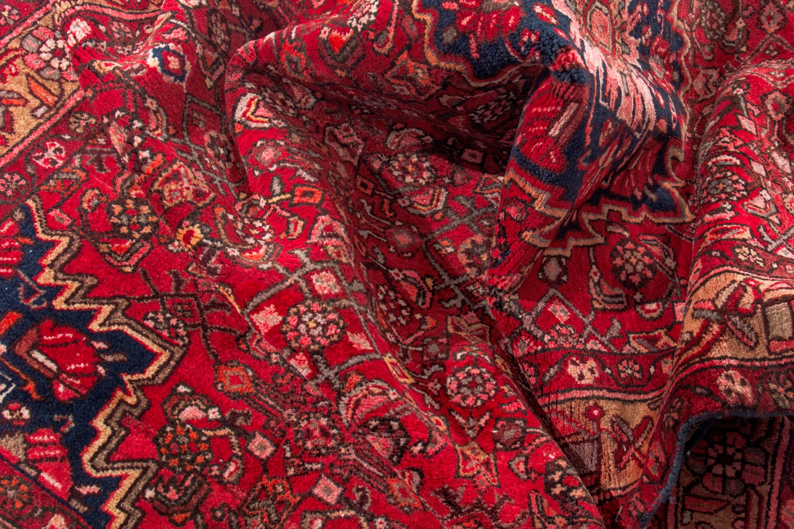 Persian Hosseinabad area rug in deep red and terracotta, view 17 of 20