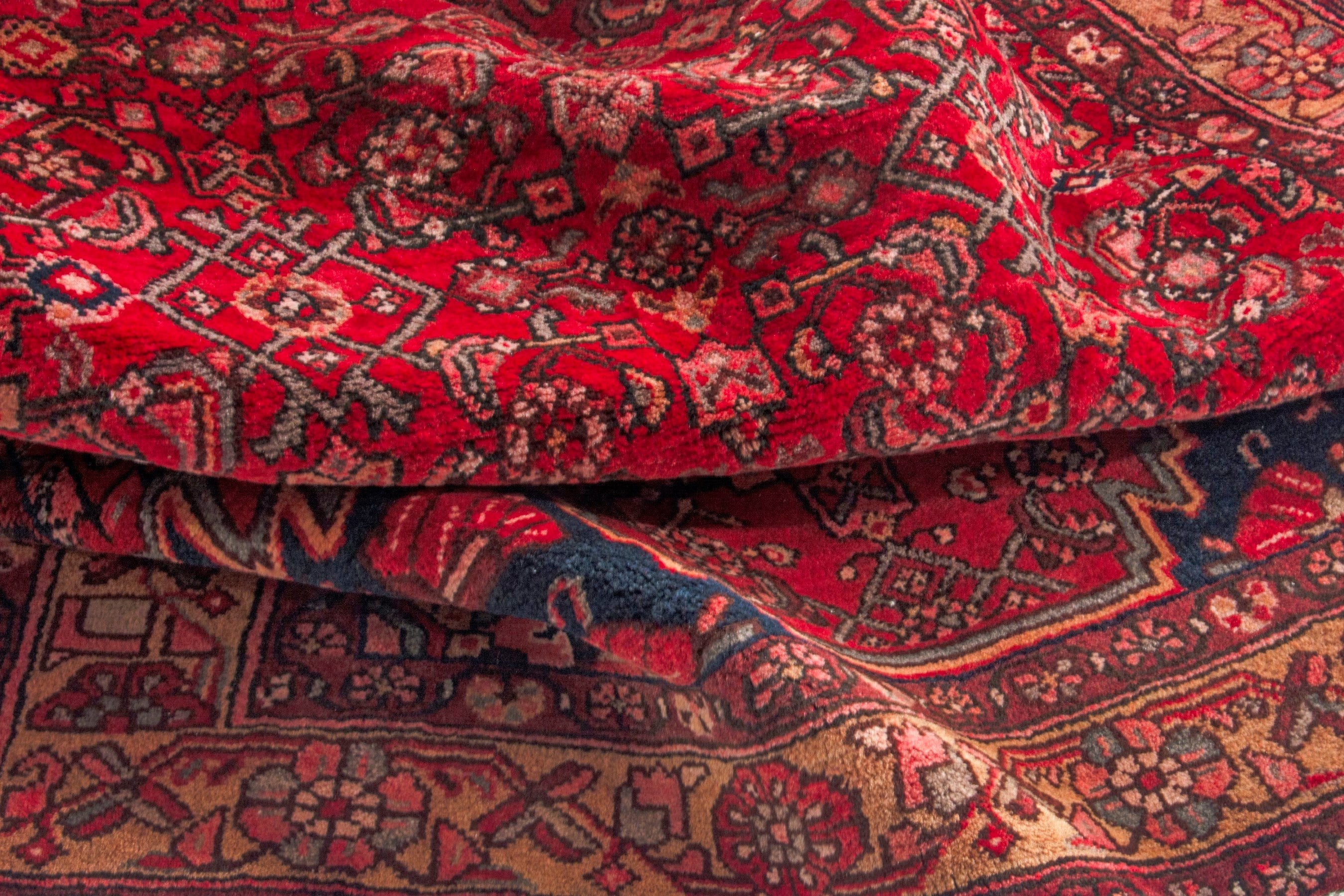 Persian Hosseinabad area rug in deep red and terracotta, view 18 of 20