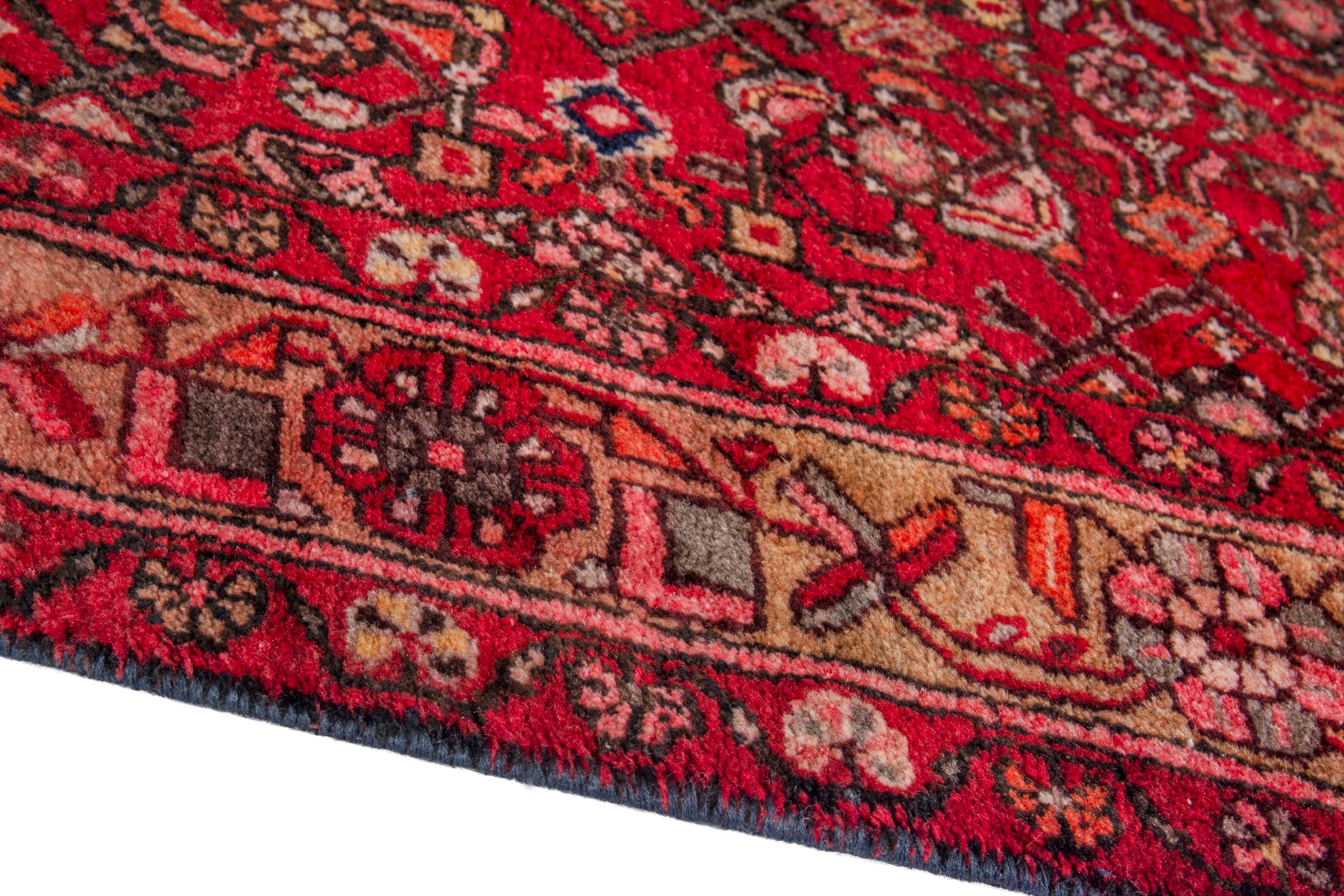 Persian Hosseinabad area rug in deep red and terracotta, view 5 of 20