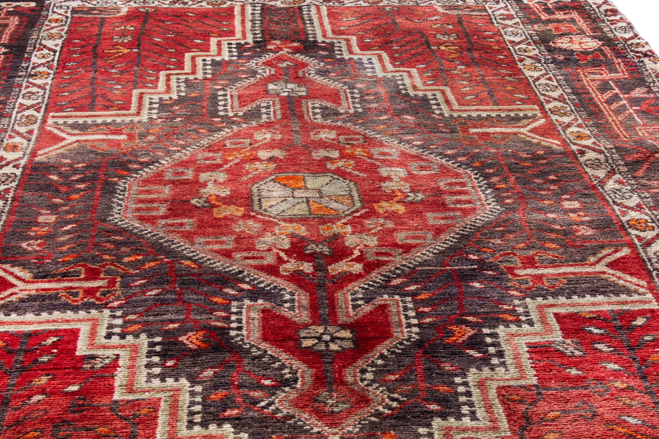 Persian Toyserkan area rug in deep red and cream, view 8 of 21