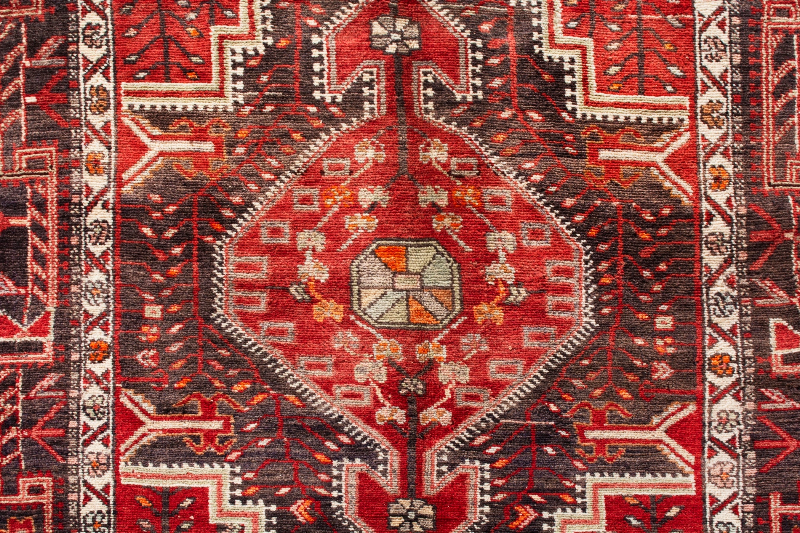 Persian Toyserkan area rug in deep red and cream, view 15 of 21