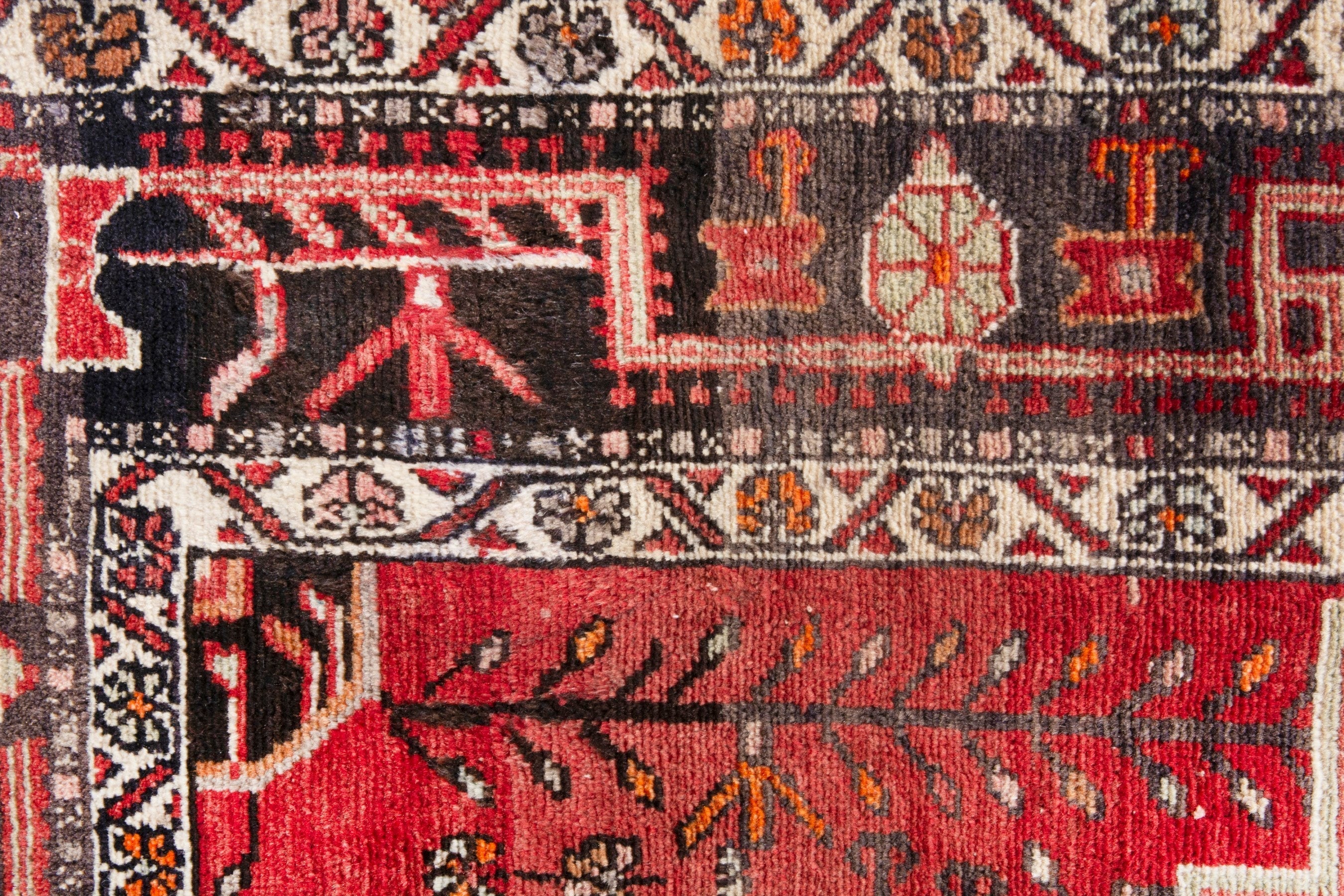 Persian Toyserkan area rug in deep red and cream, view 14 of 21