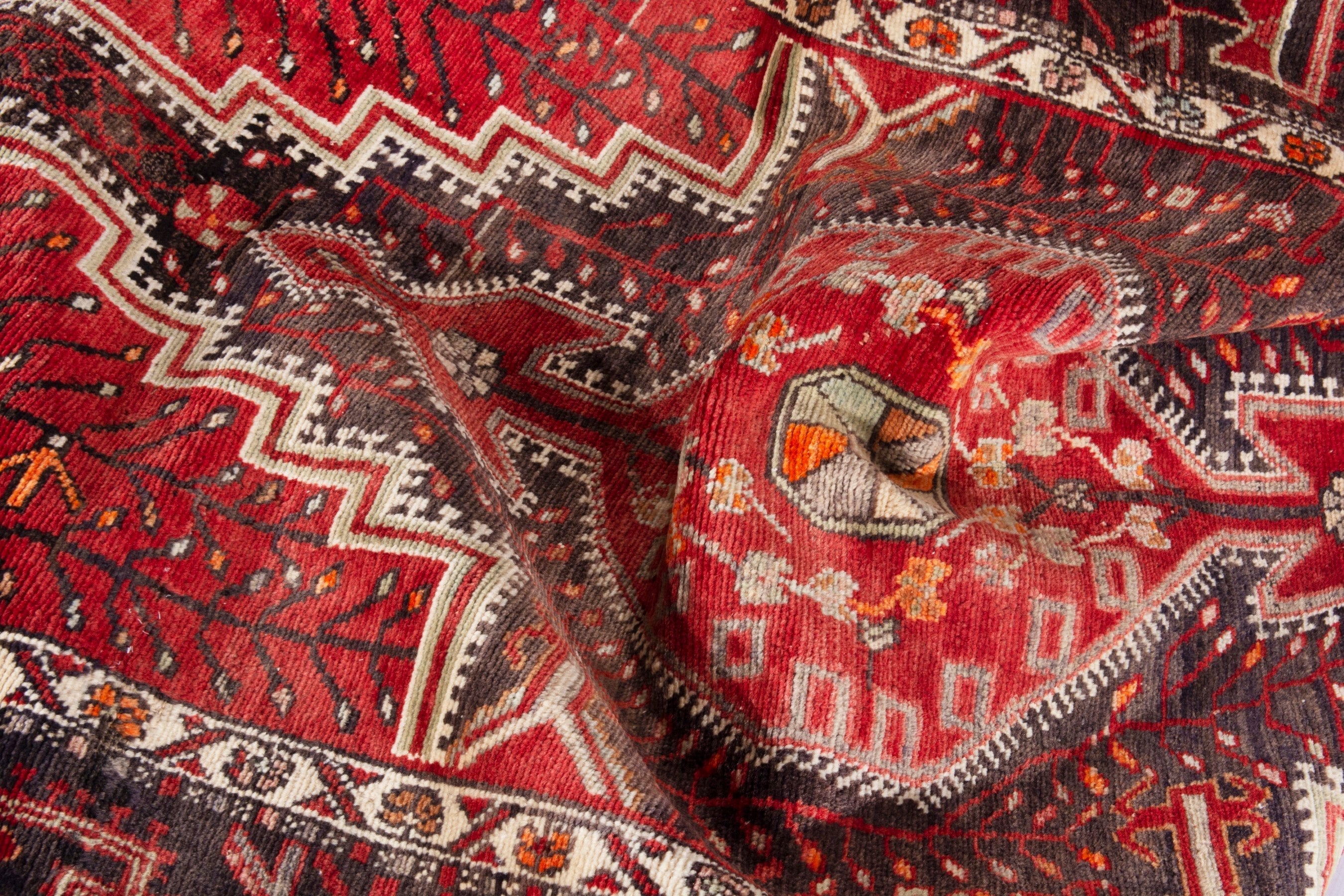 Persian Toyserkan area rug in deep red and cream, view 17 of 21