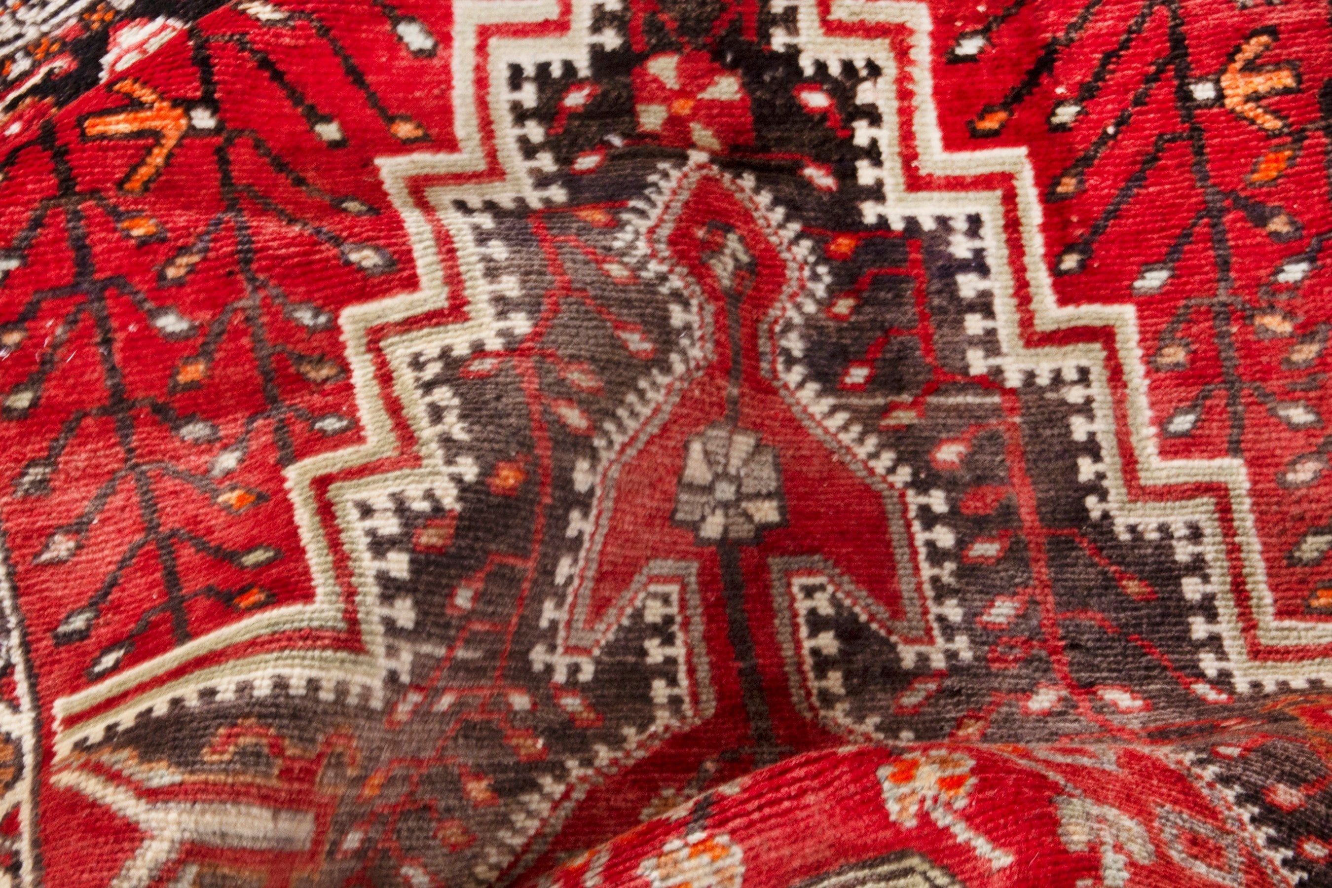 Persian Toyserkan area rug in deep red and cream, view 19 of 21