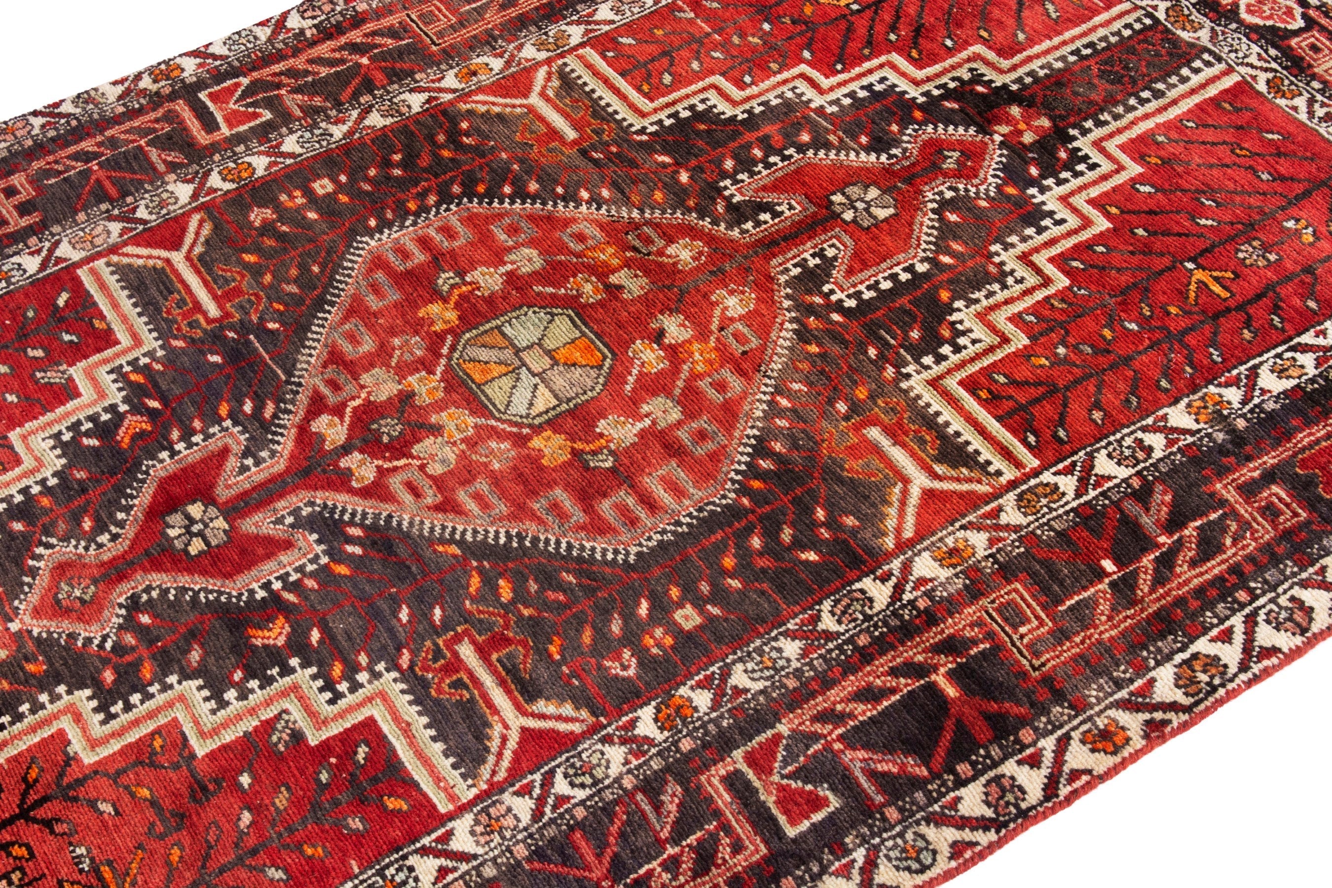 Persian Toyserkan area rug in deep red and cream, view 6 of 21