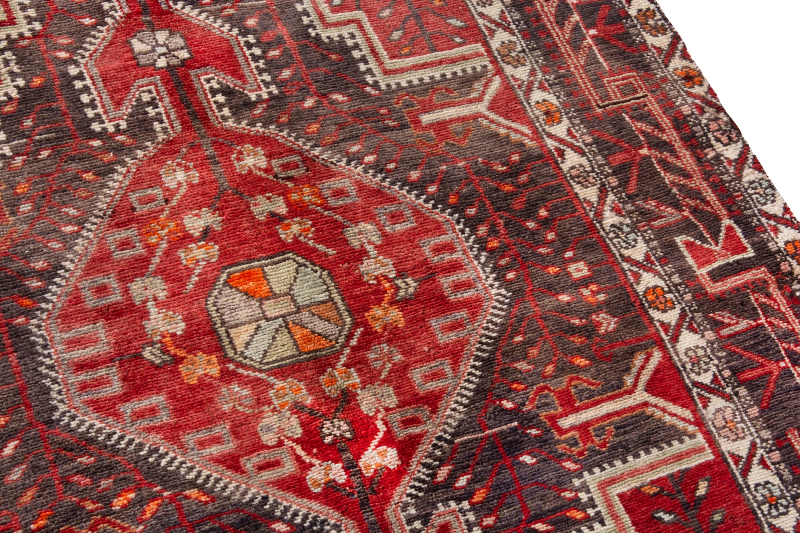 Persian Toyserkan area rug in deep red and cream, view 9 of 21