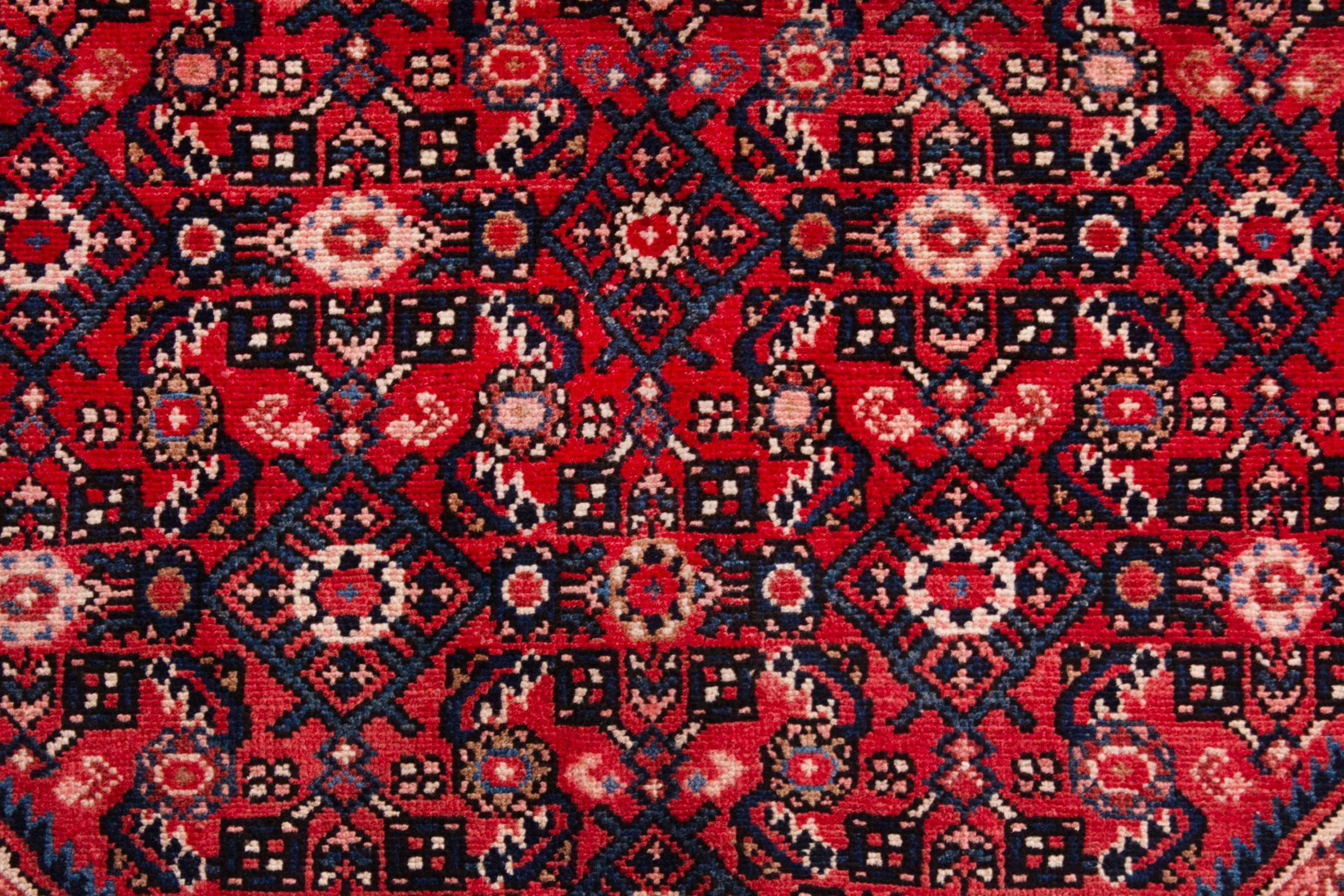 Persian Hosseinabad area rug in deep red and cream, view 11 of 21