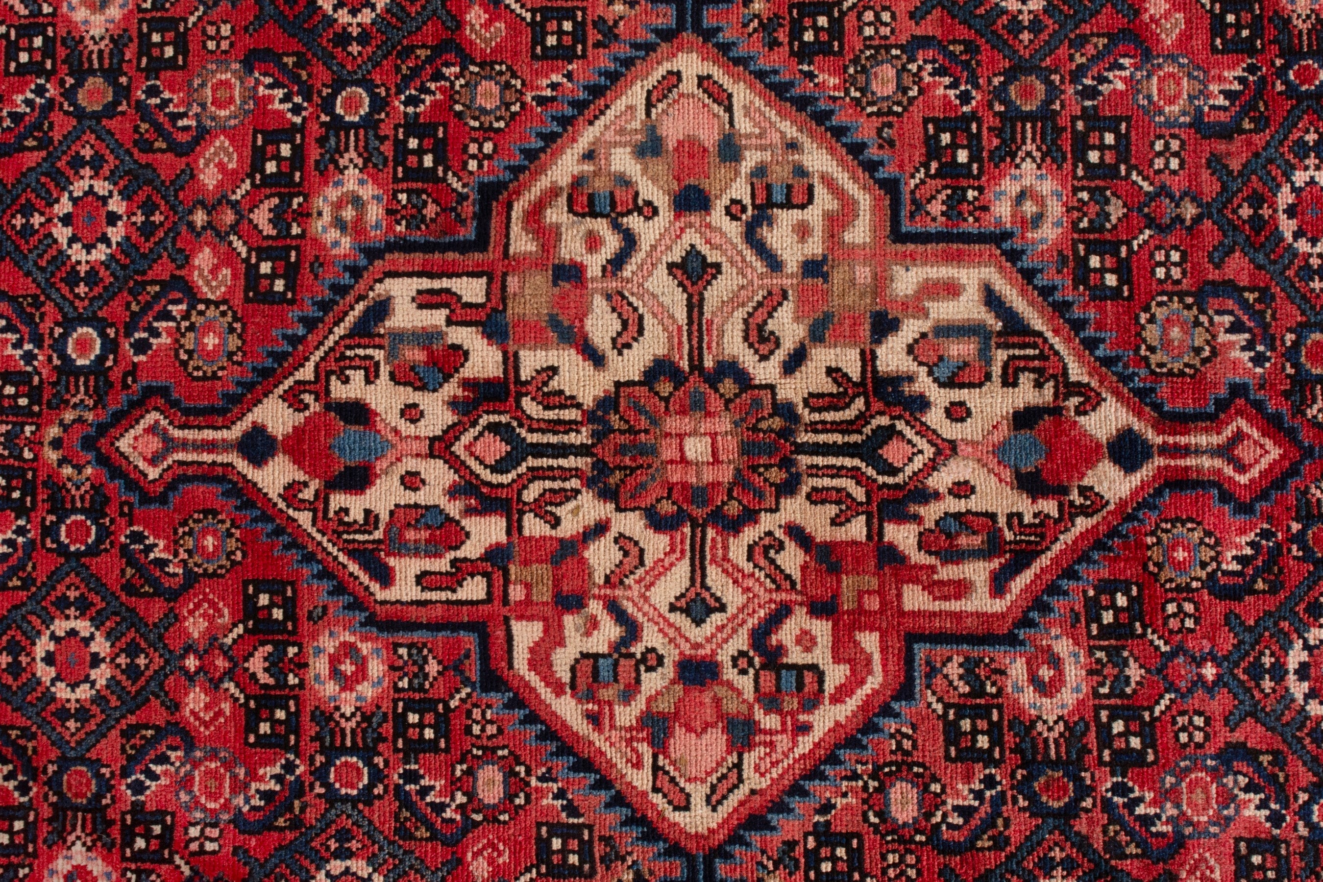 Persian Hosseinabad area rug in deep red and cream, view 17 of 21