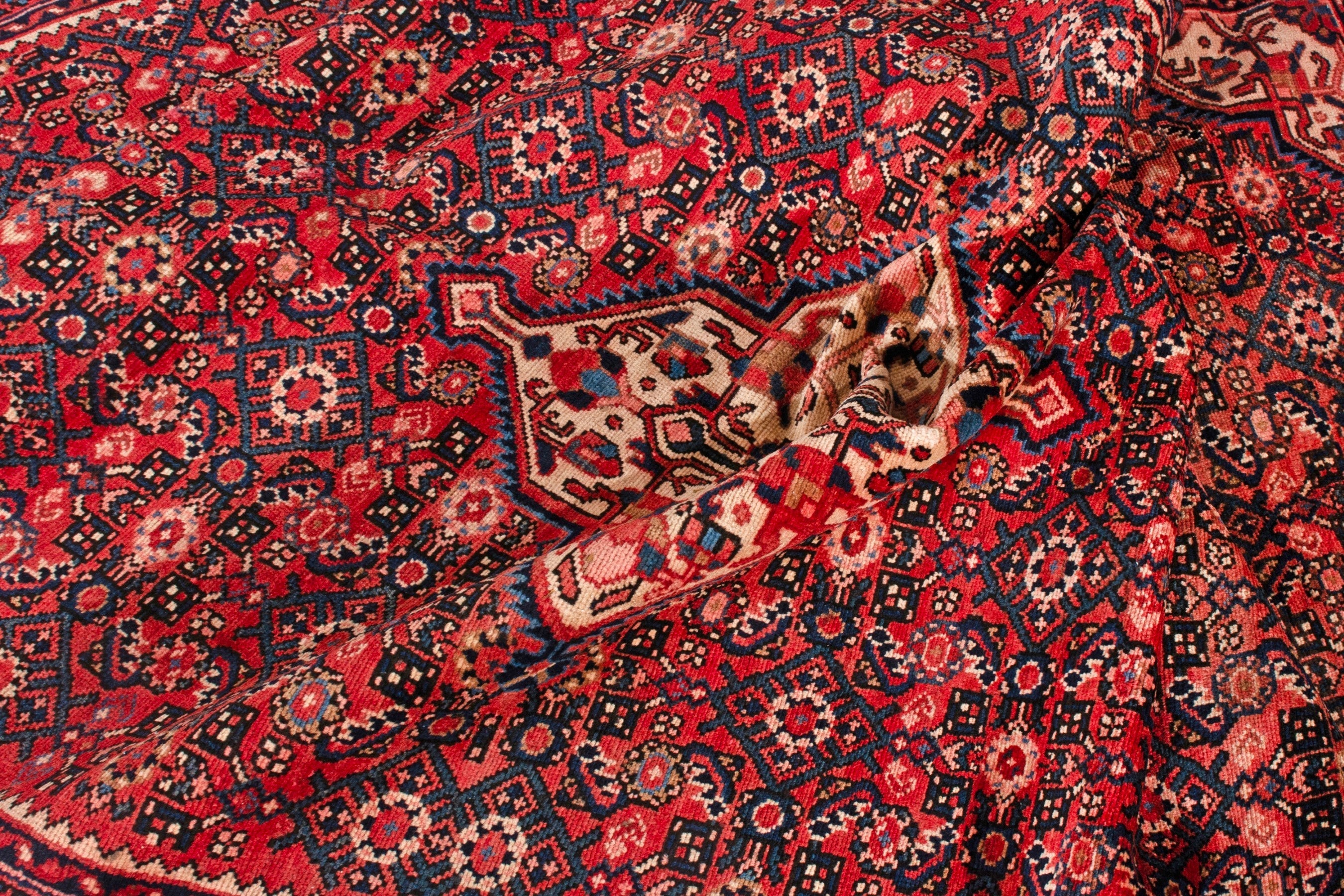 Persian Hosseinabad area rug in deep red and cream, view 18 of 21