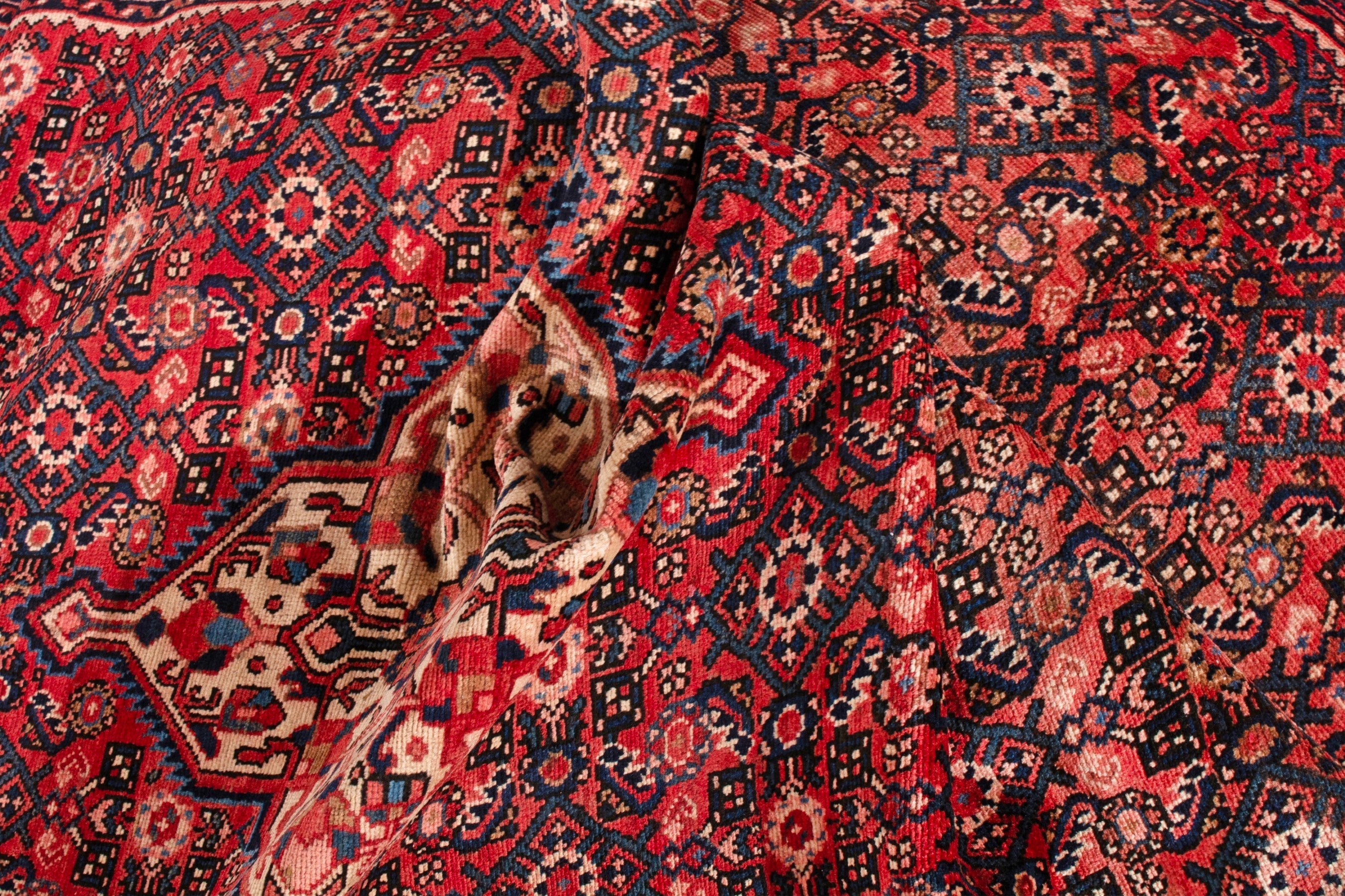 Persian Hosseinabad area rug in deep red and cream, view 19 of 21