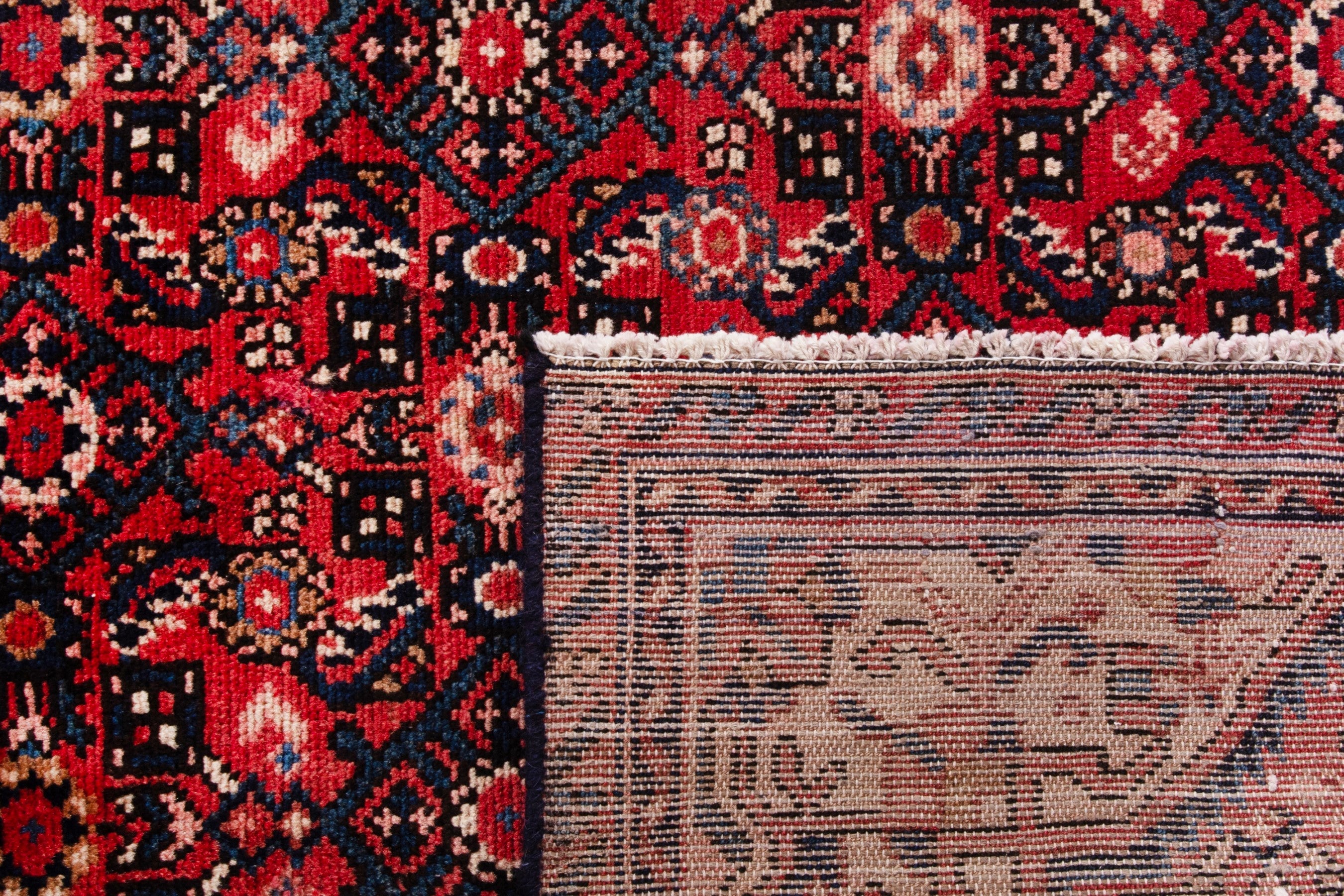 Persian Hosseinabad area rug in deep red and cream, view 21 of 21