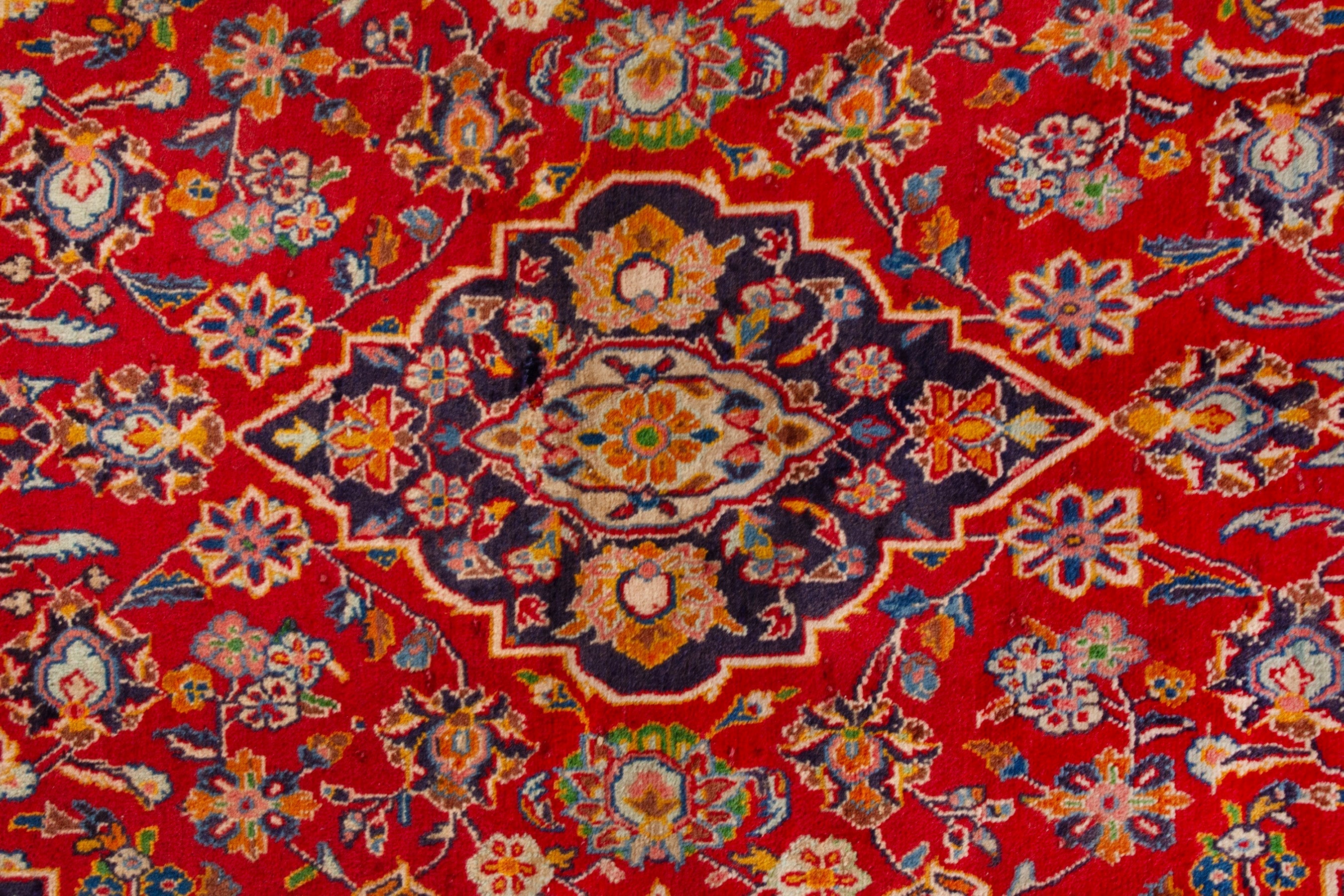 Persian Kashan area rug in deep red and navy, view 13 of 18