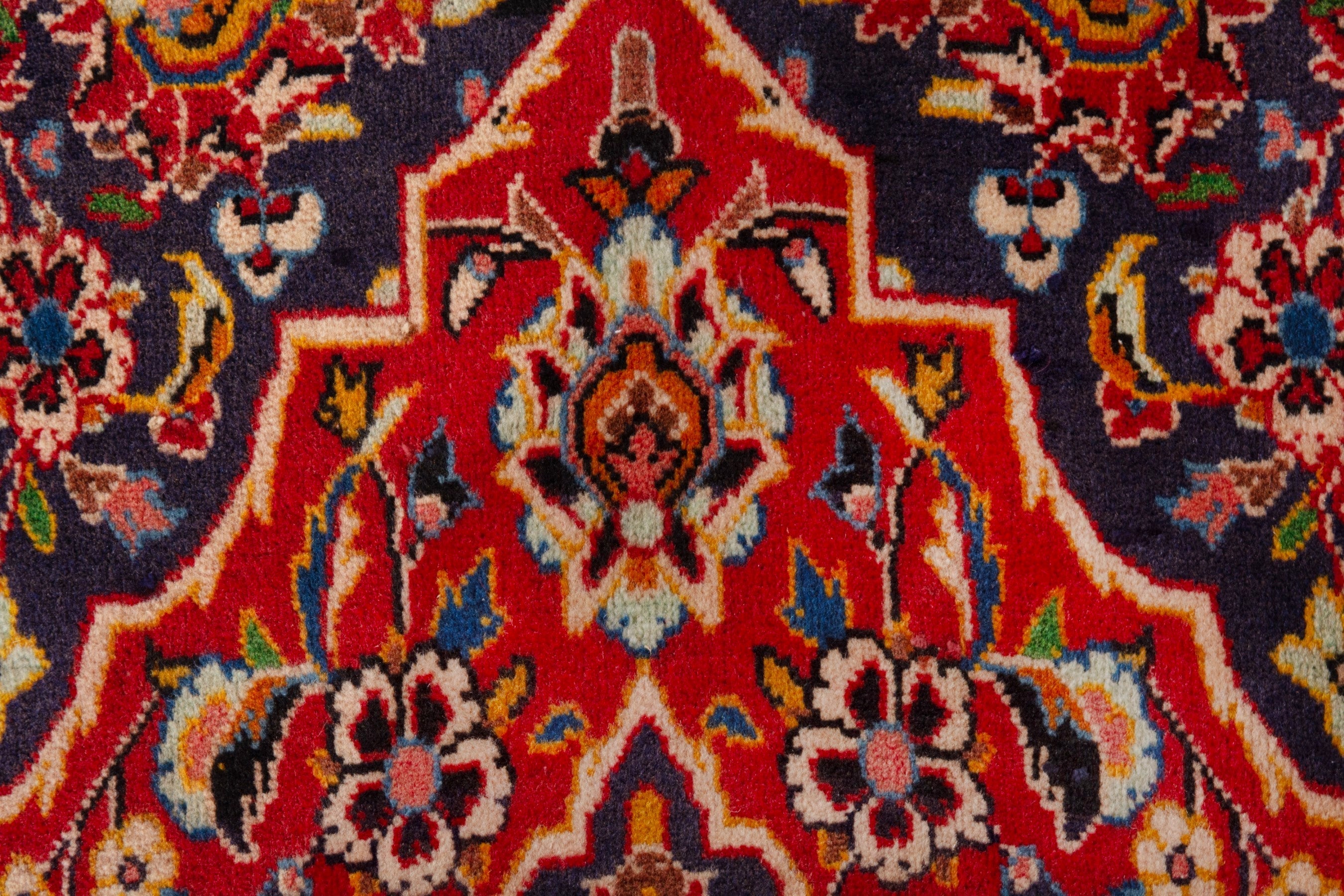 Persian Kashan area rug in deep red and navy, view 14 of 18