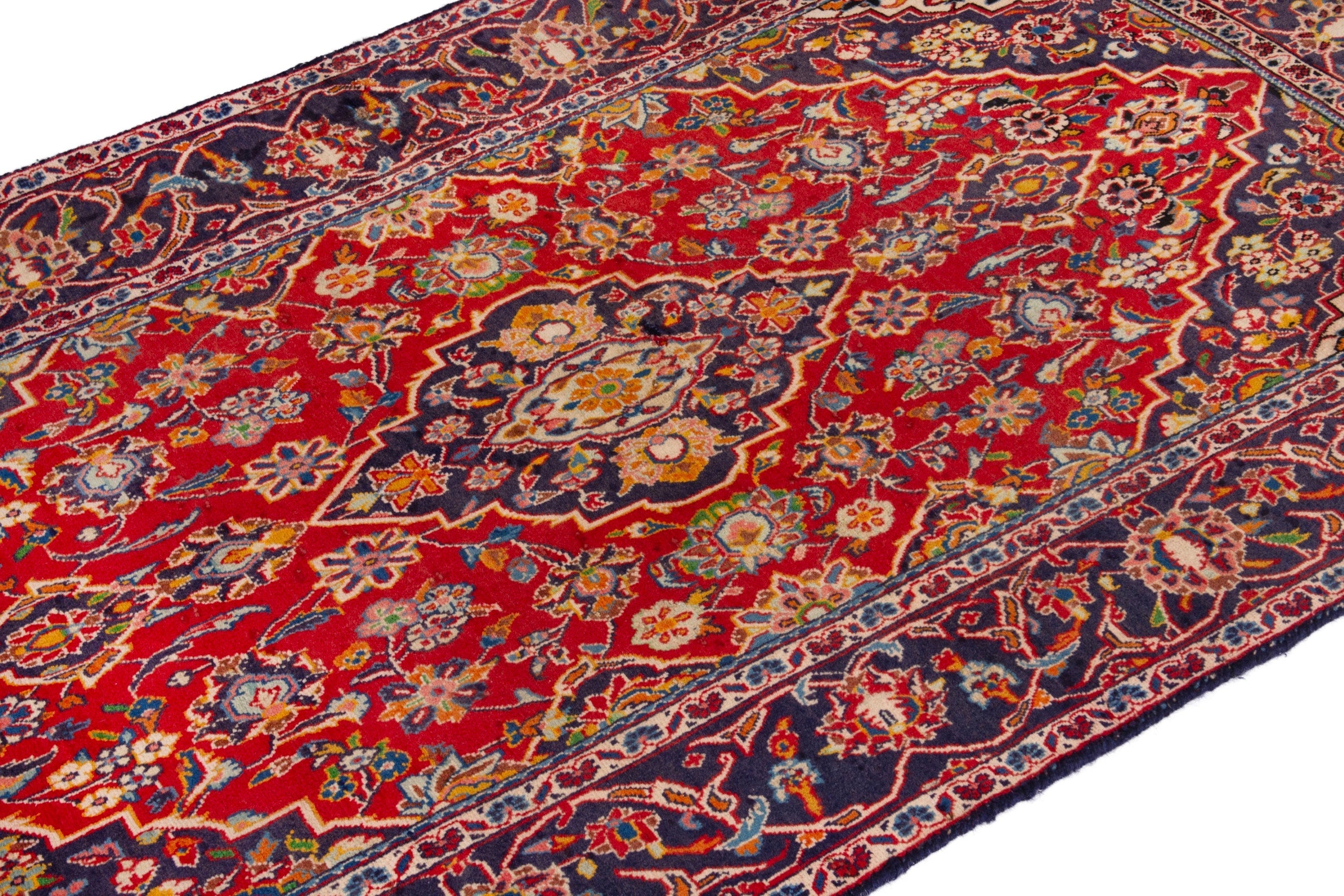 Persian Kashan area rug in deep red and navy, view 6 of 18