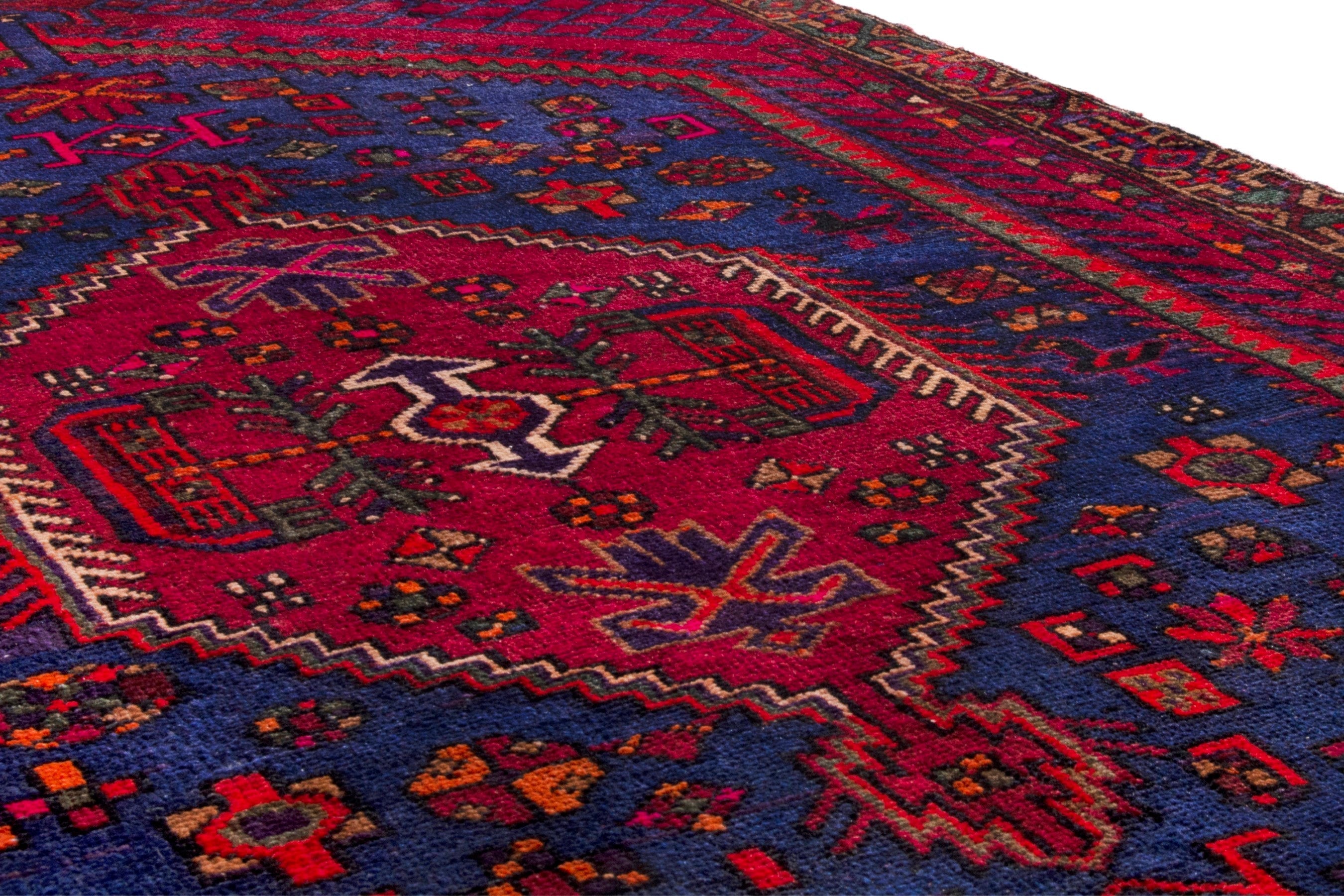 Persian Zanjan area rug in navy and deep red, view 8 of 17