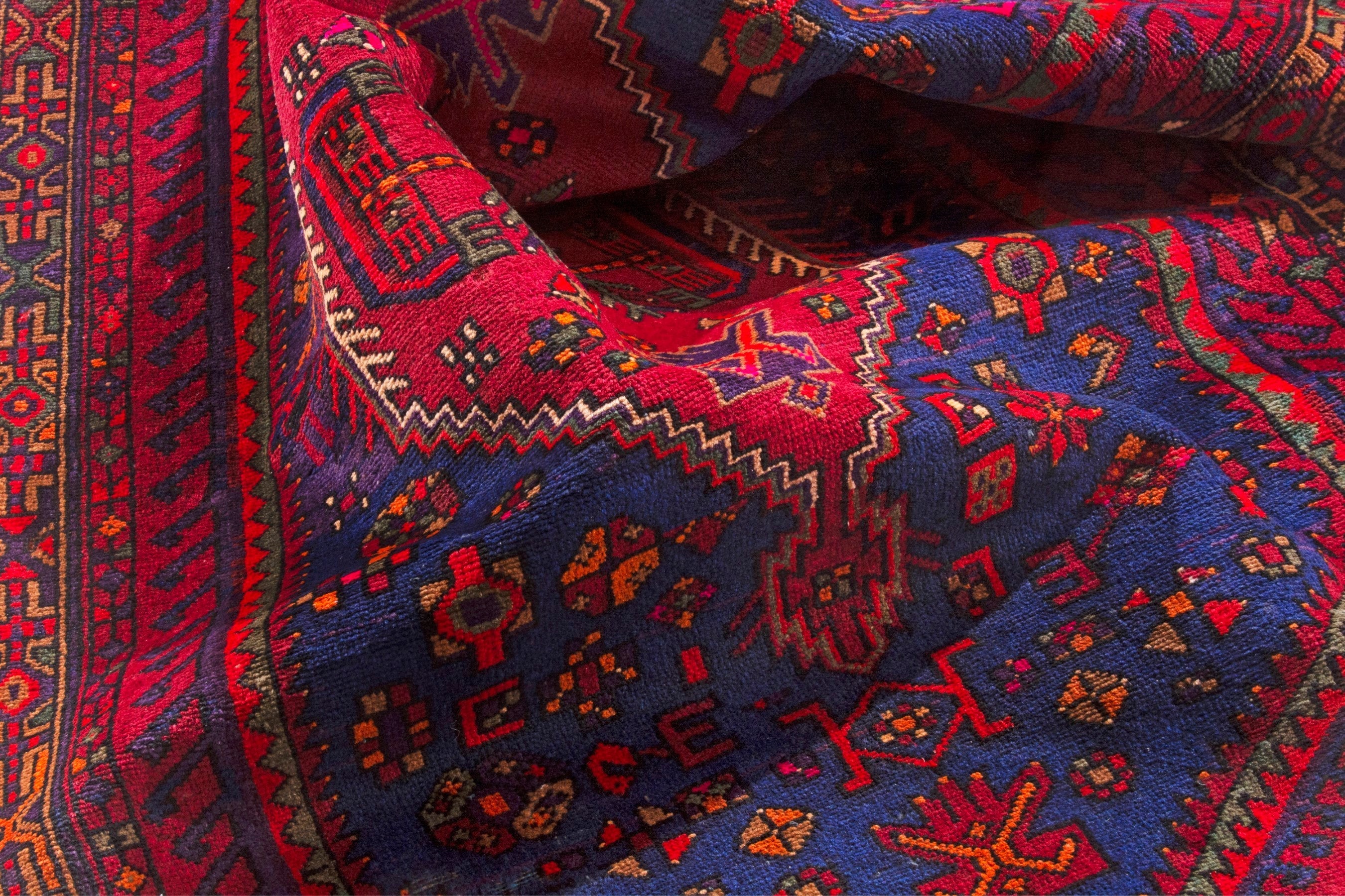 Persian Zanjan area rug in navy and deep red, view 16 of 17