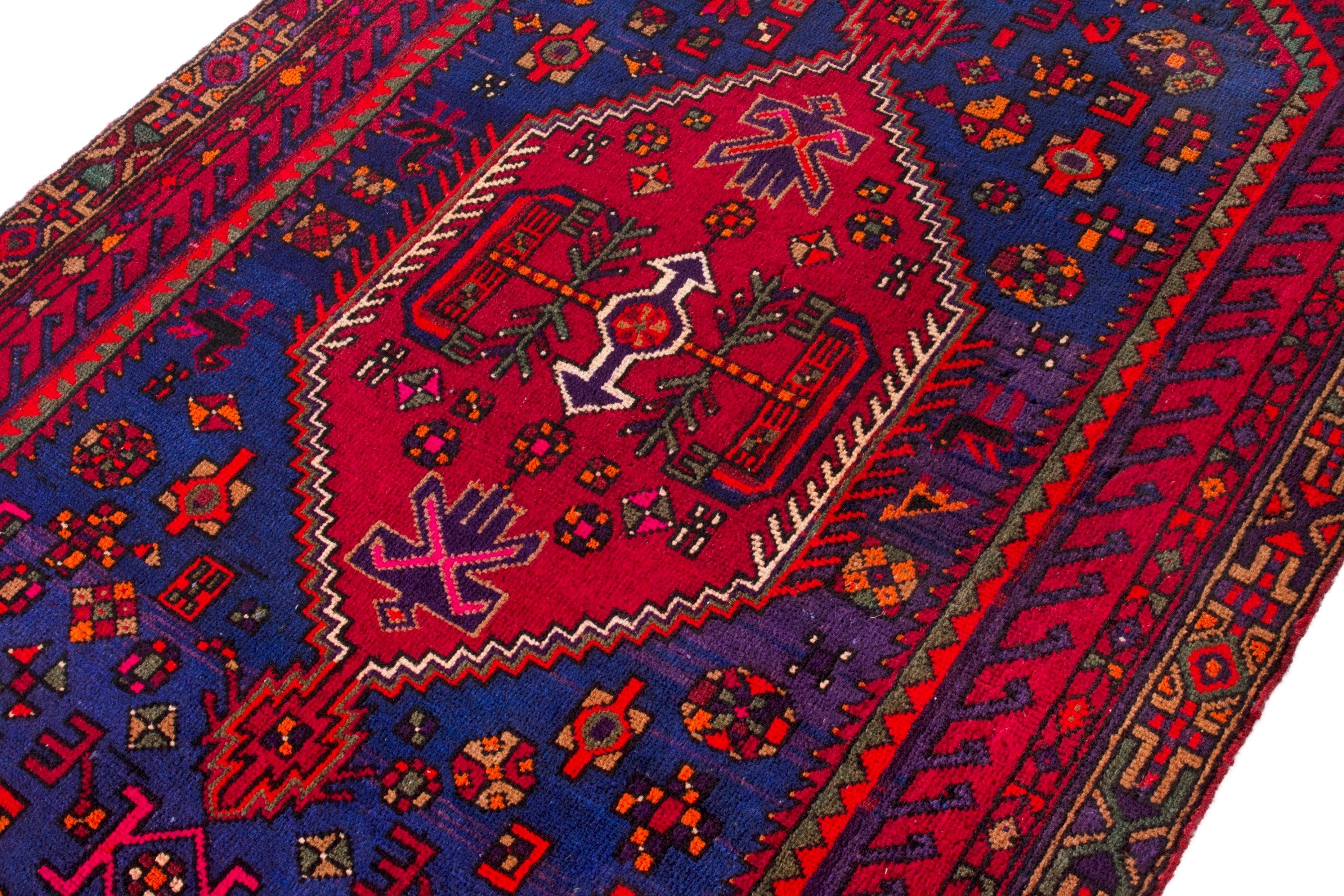Persian Zanjan area rug in navy and deep red, view 6 of 17