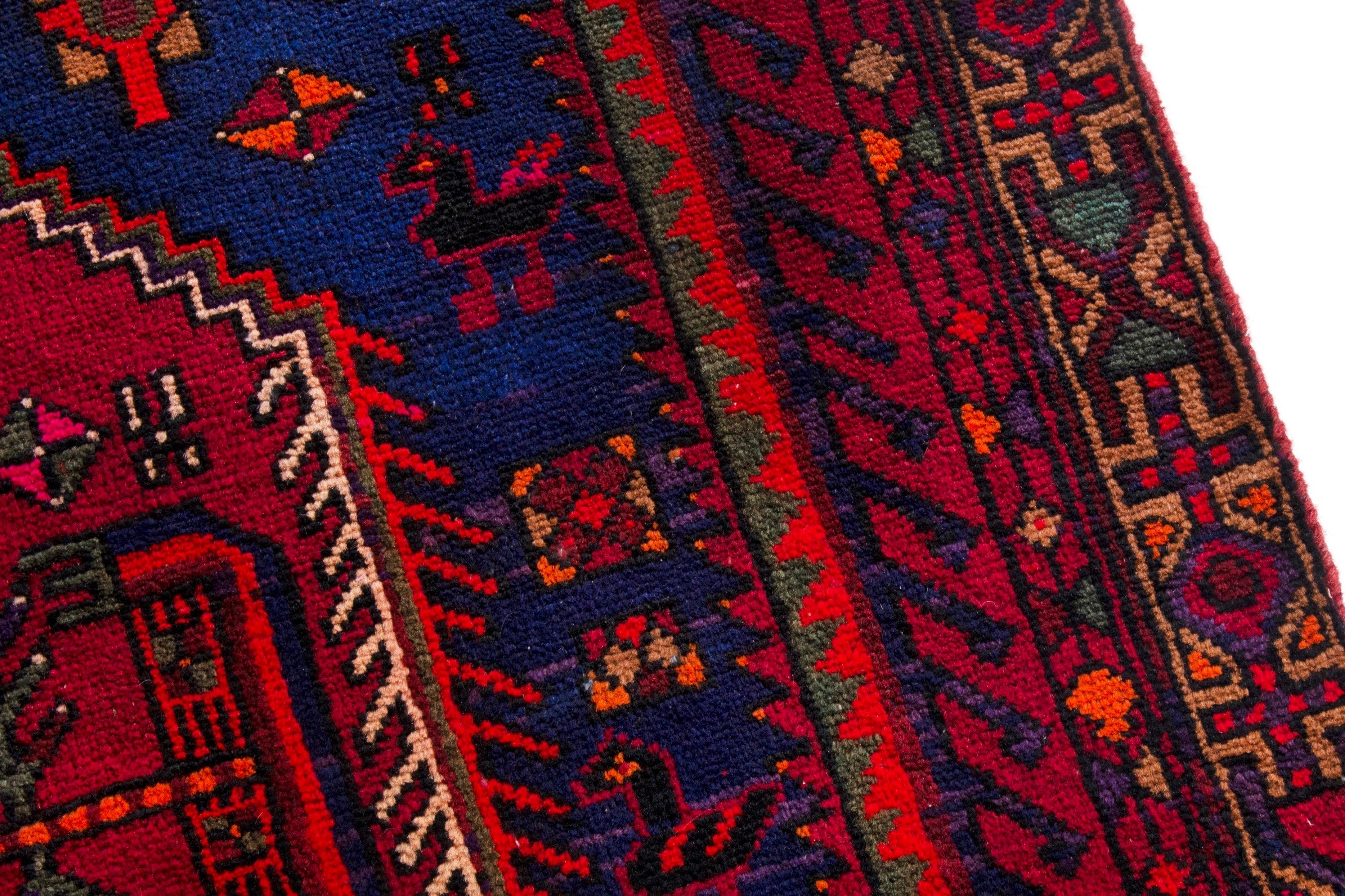 Persian Zanjan area rug in navy and deep red, view 9 of 17