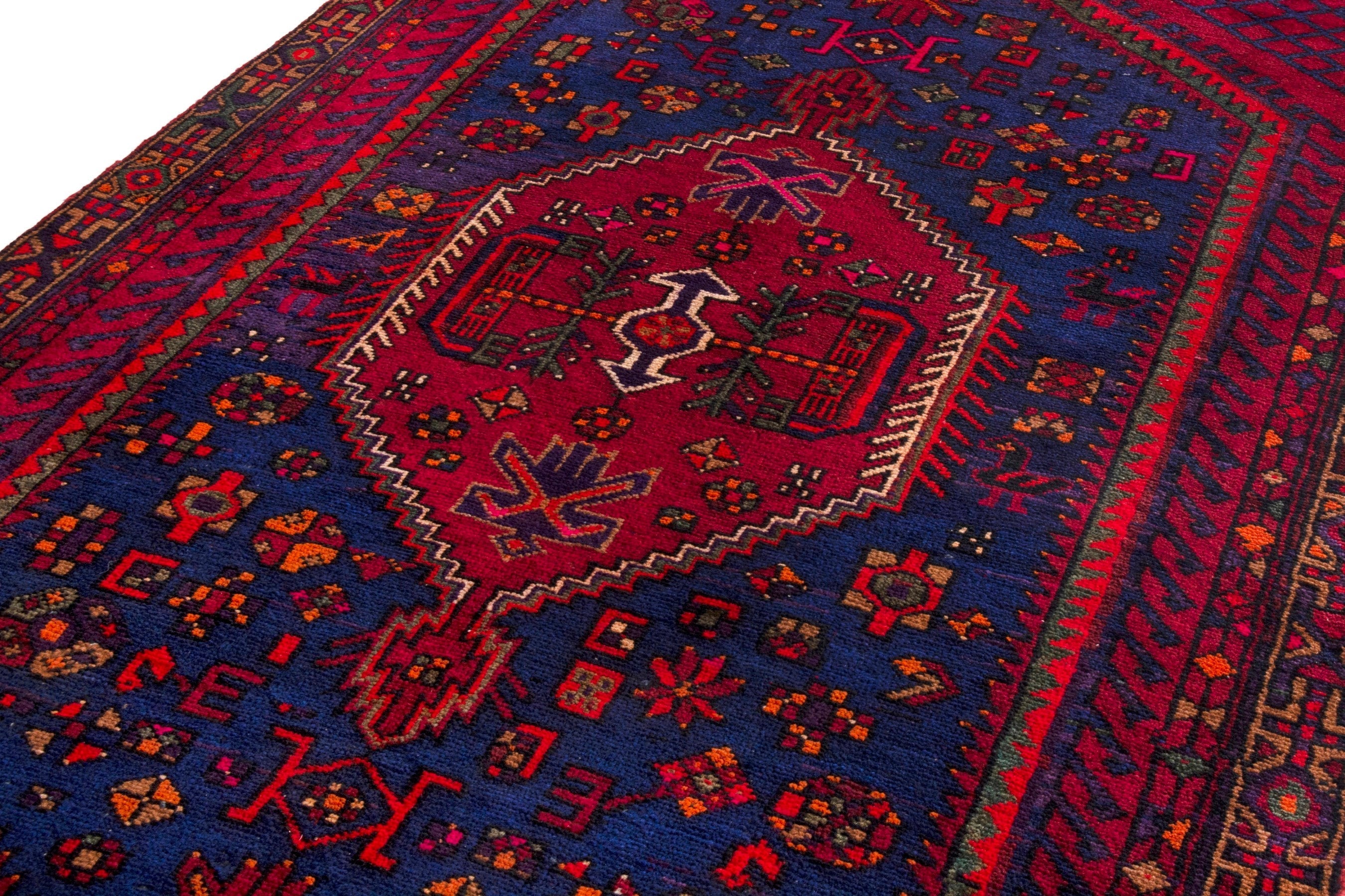 Persian Zanjan area rug in navy and deep red, view 7 of 17