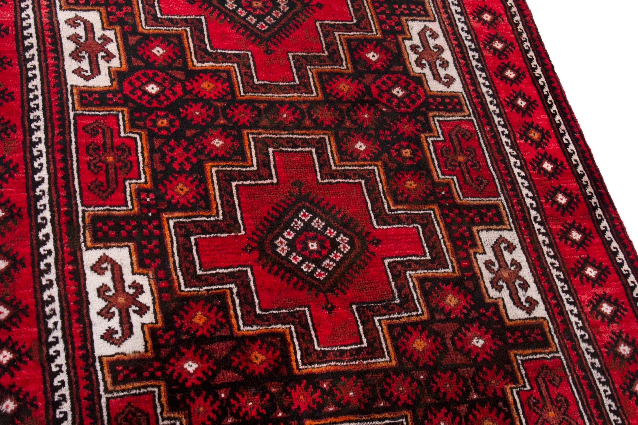 Persian Baluch area rug in deep red and burgundy, view 9 of 19