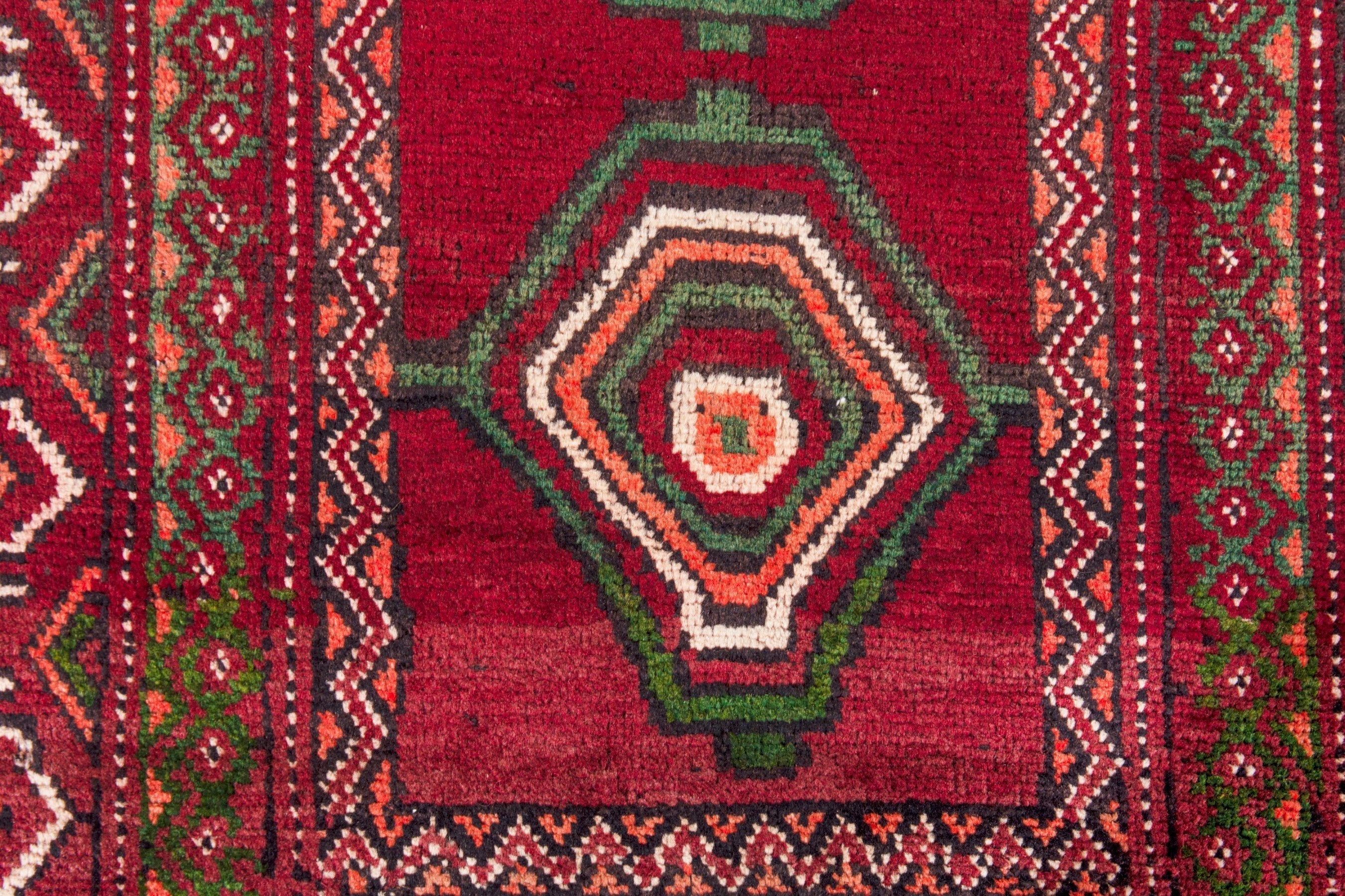 Persian Torkaman runner rug in deep red and faded red, view 16 of 22