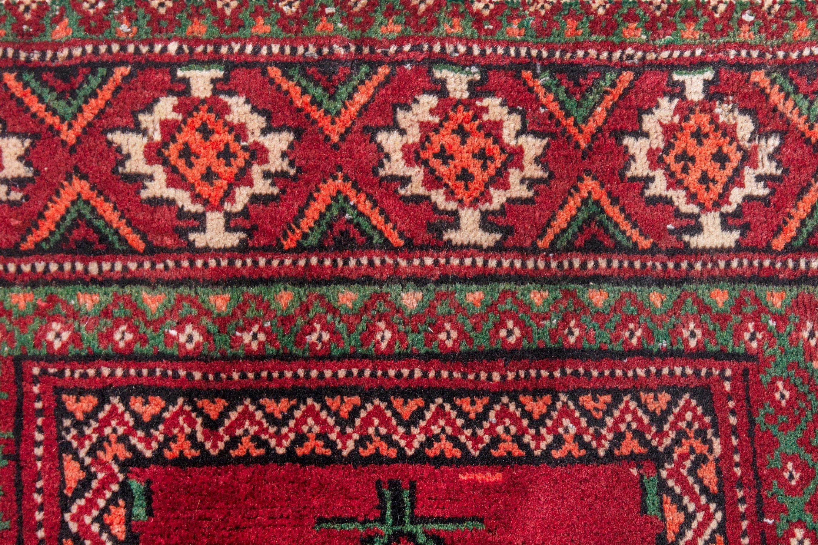 Persian Torkaman runner rug in deep red and faded red, view 13 of 22