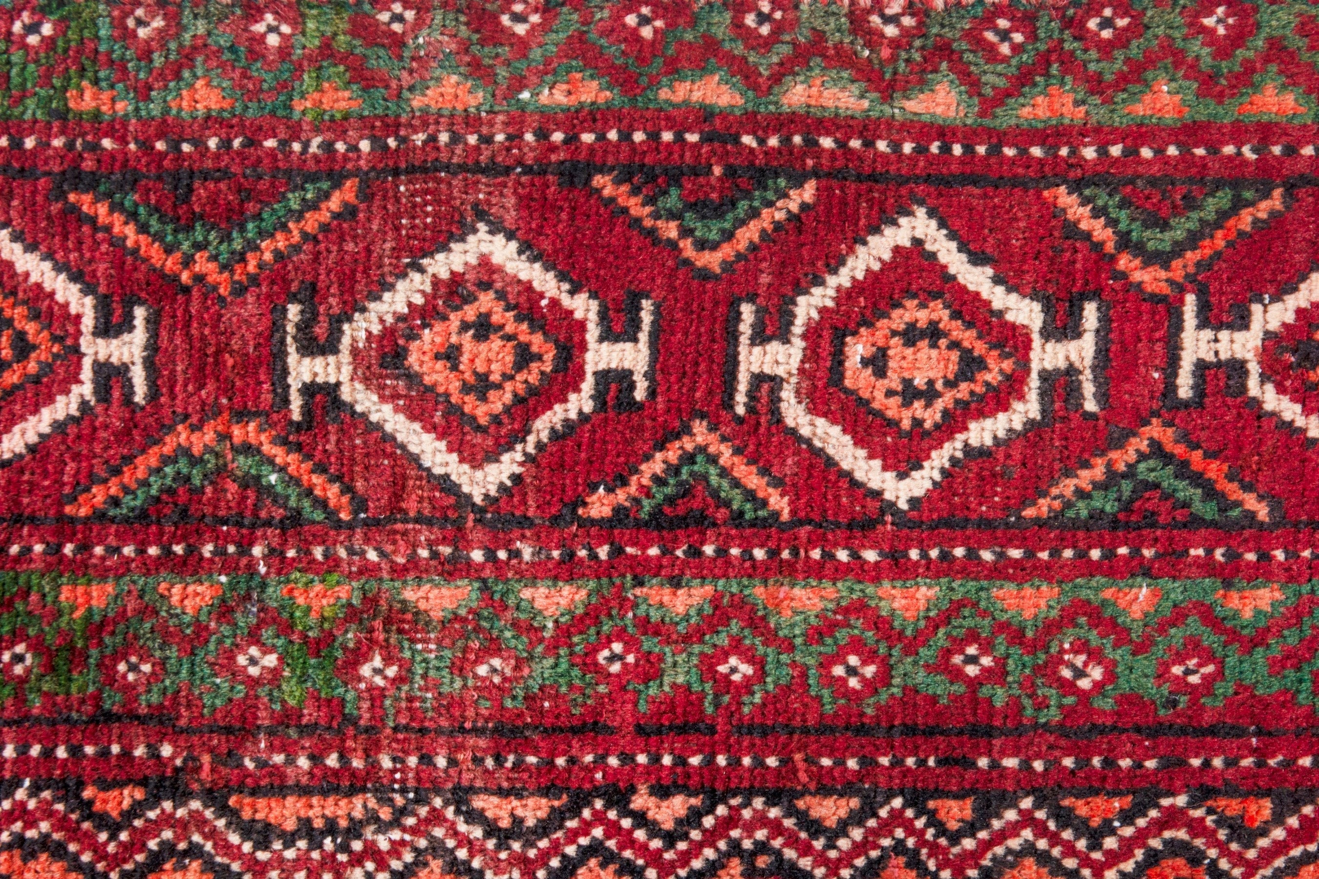 Persian Torkaman runner rug in deep red and faded red, view 14 of 22