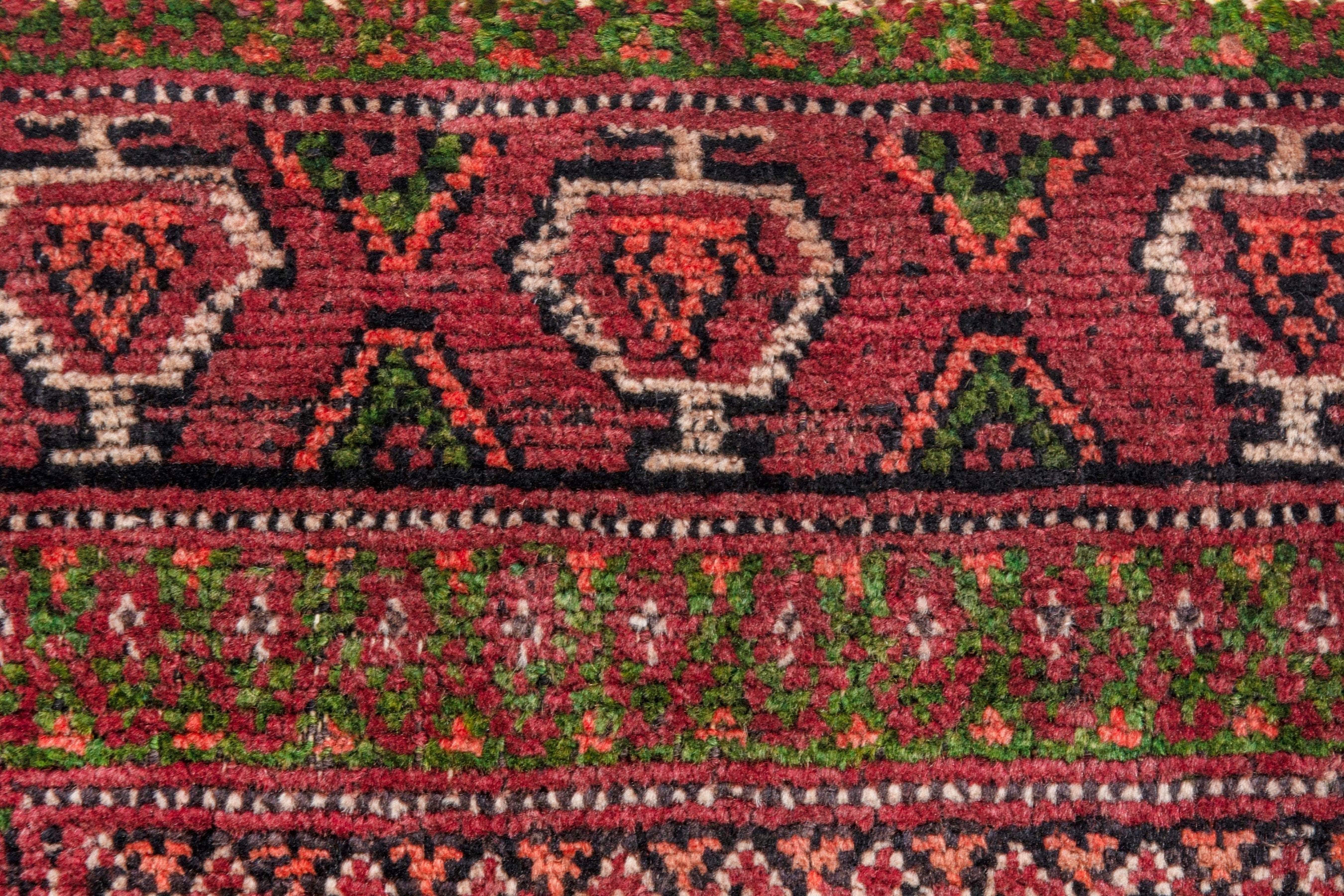 Persian Torkaman runner rug in deep red and faded red, view 15 of 22