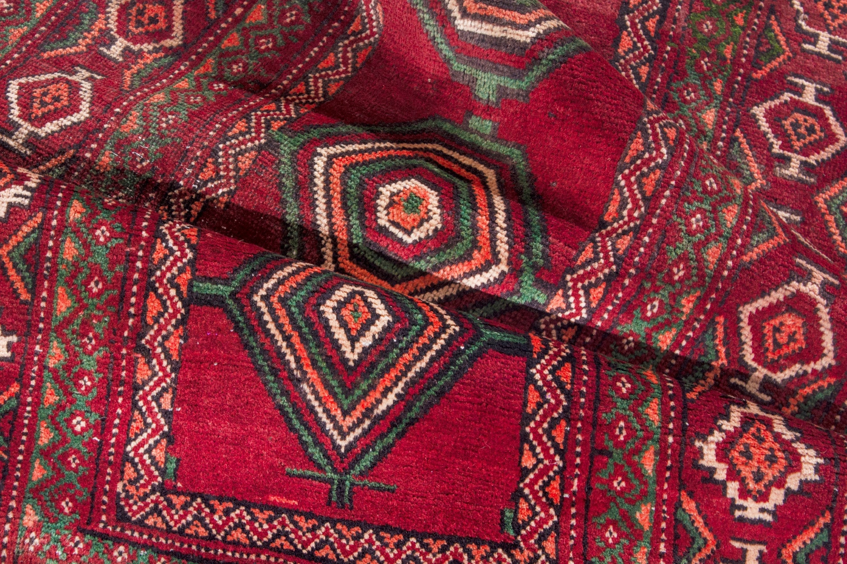 Persian Torkaman runner rug in deep red and faded red, view 20 of 22