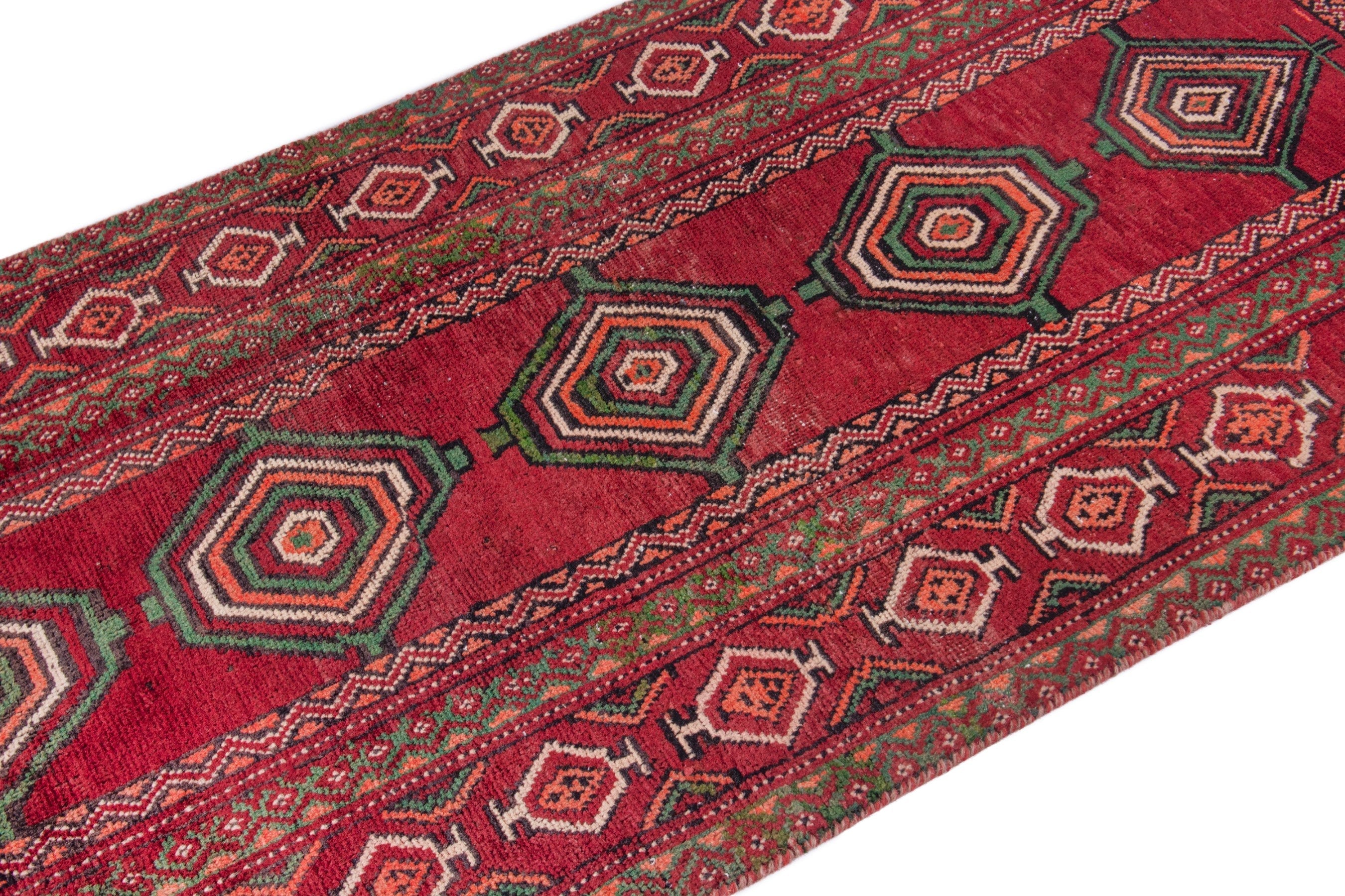 Persian Torkaman runner rug in deep red and faded red, view 6 of 22