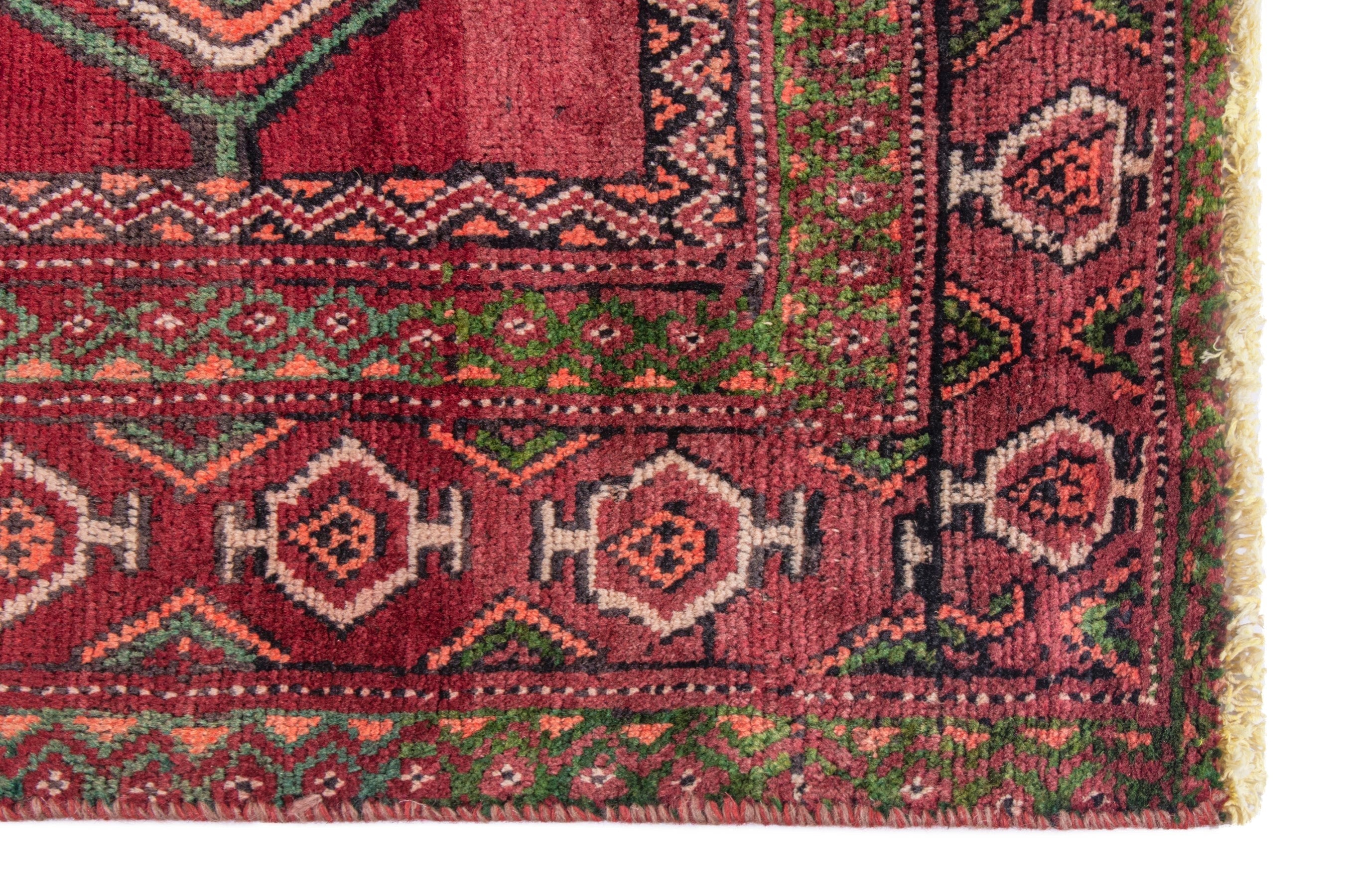 Persian Torkaman runner rug in deep red and faded red, view 11 of 22